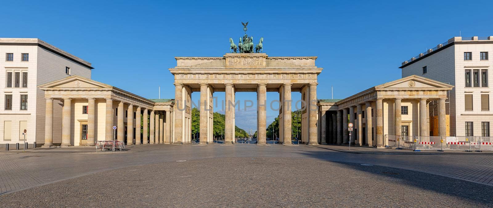 Panorama of the famous Brandenburg Gate in Berlin early in the morning with no people
