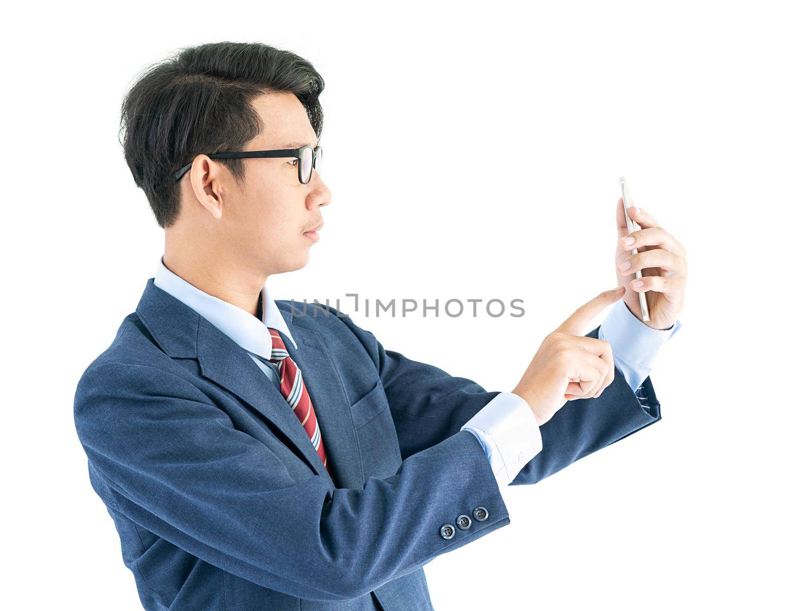 Young asian business men portrait in suit  holding smartphone against white background