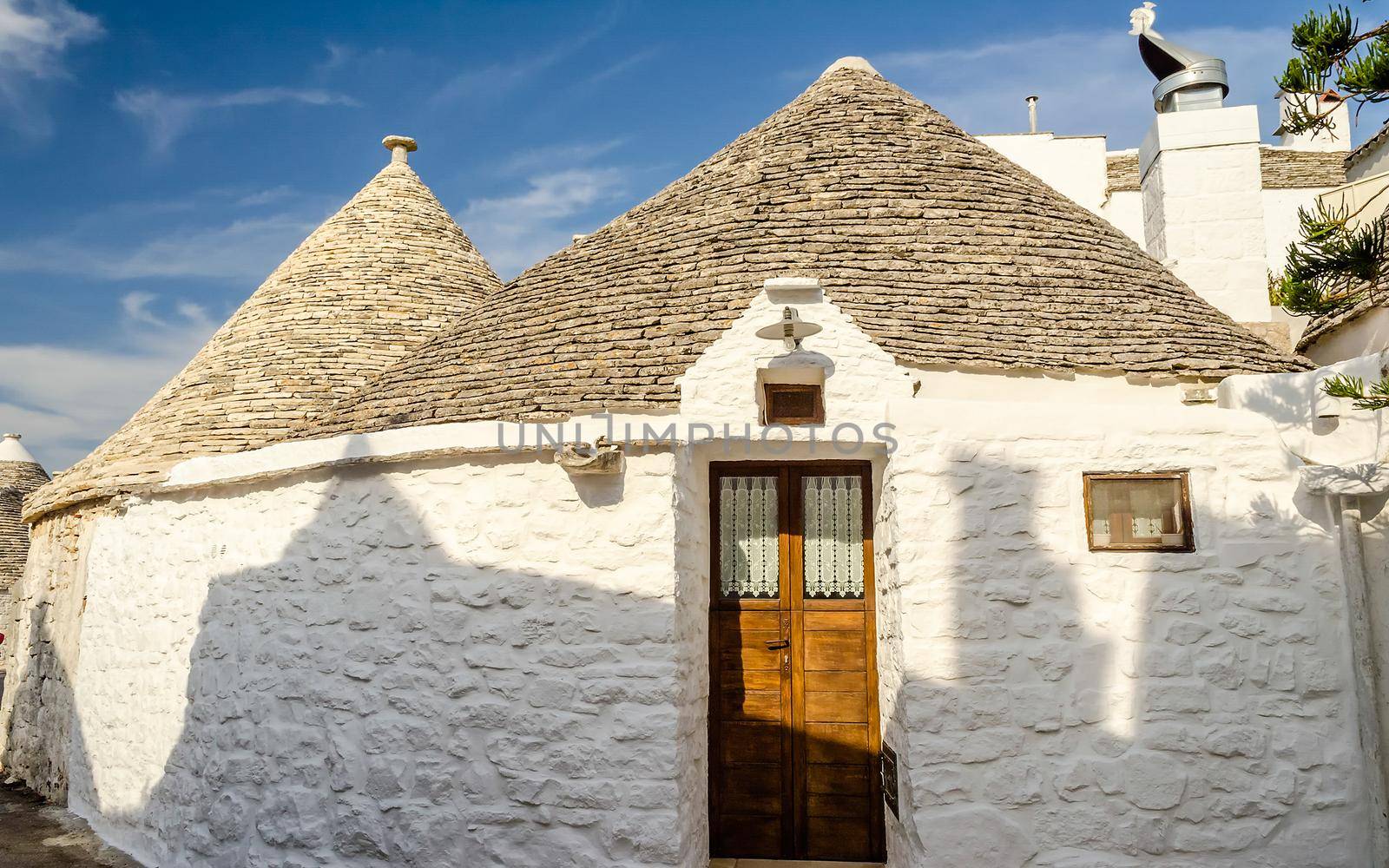 Typical trulli buildings with conical roofs in Alberobello, Apulia, Italy