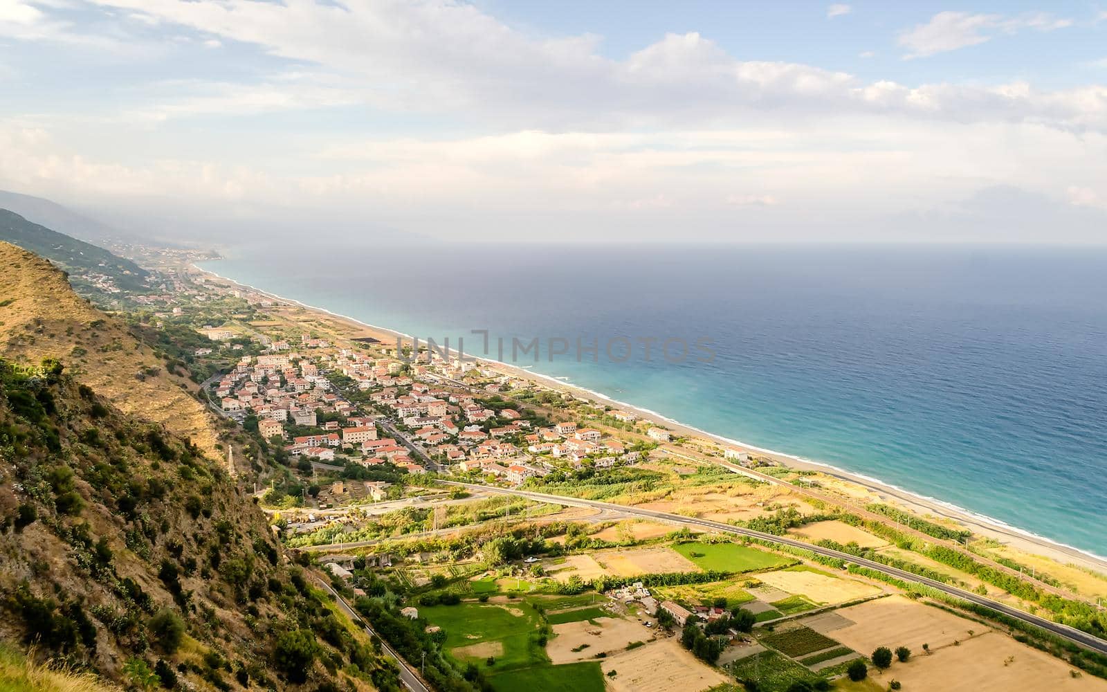 Aerial view over the coastline in Calabria, Italy by marcorubino