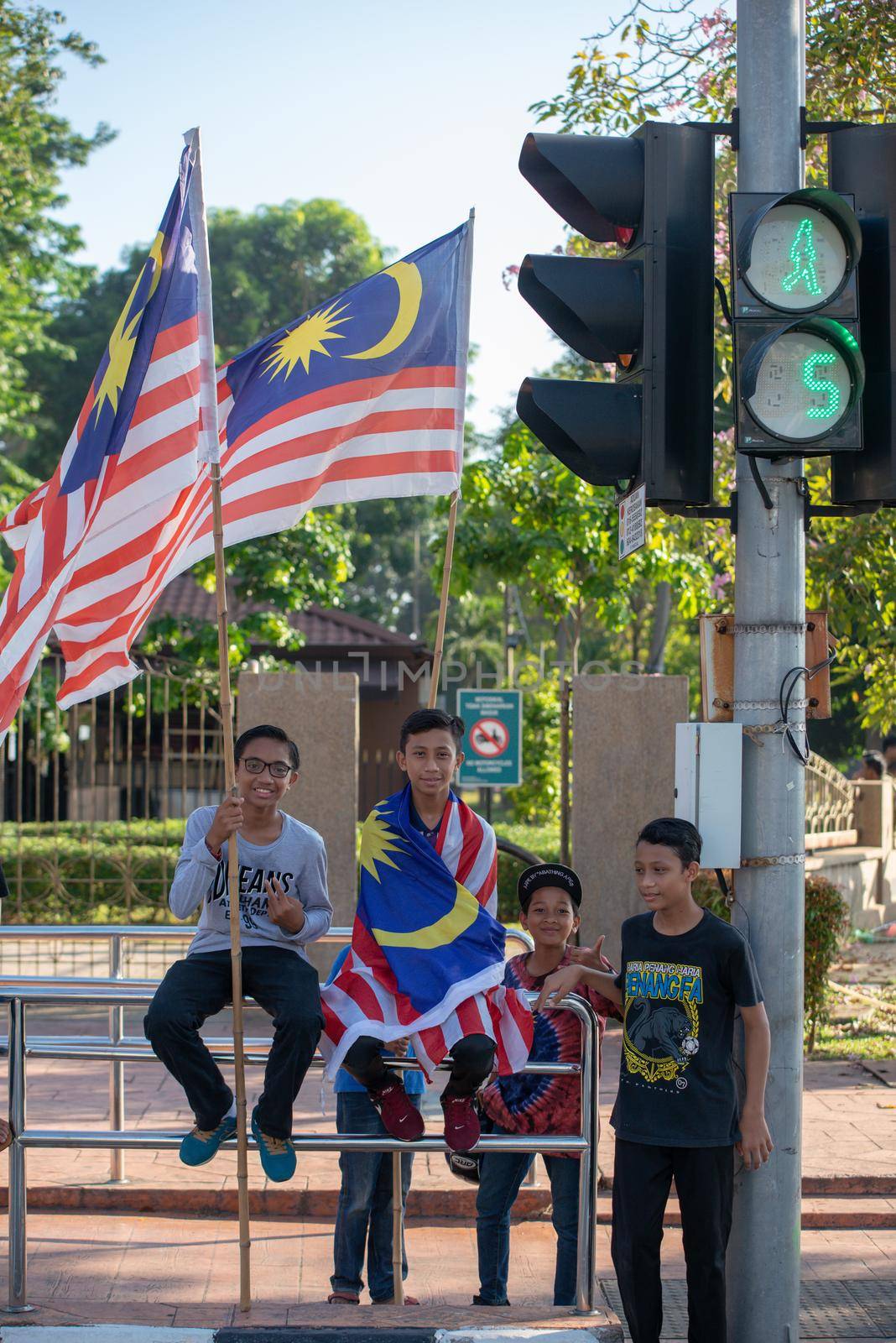 George Town, Penang/Malaysia - Aug 31 2017: Children bring Malaysia flag during national day celebration.