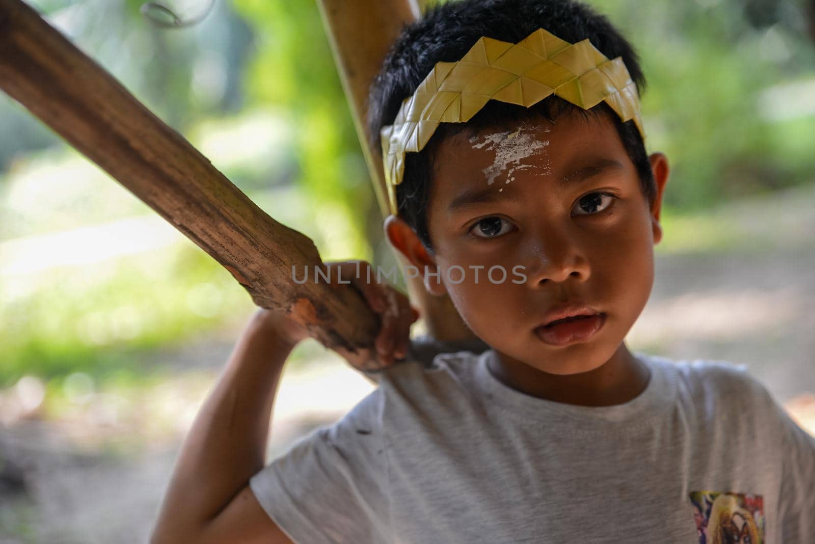 Carey Island, Selangor/Malaysia - Mar 17 2018: Mah Meri kid look at camera.