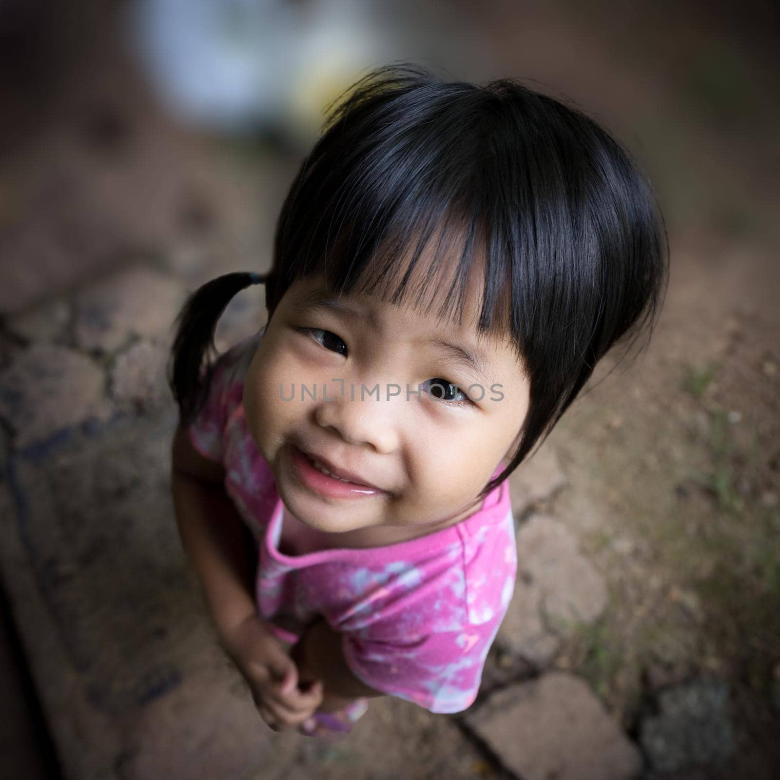 close up face of happy positive smiling  little asian girl