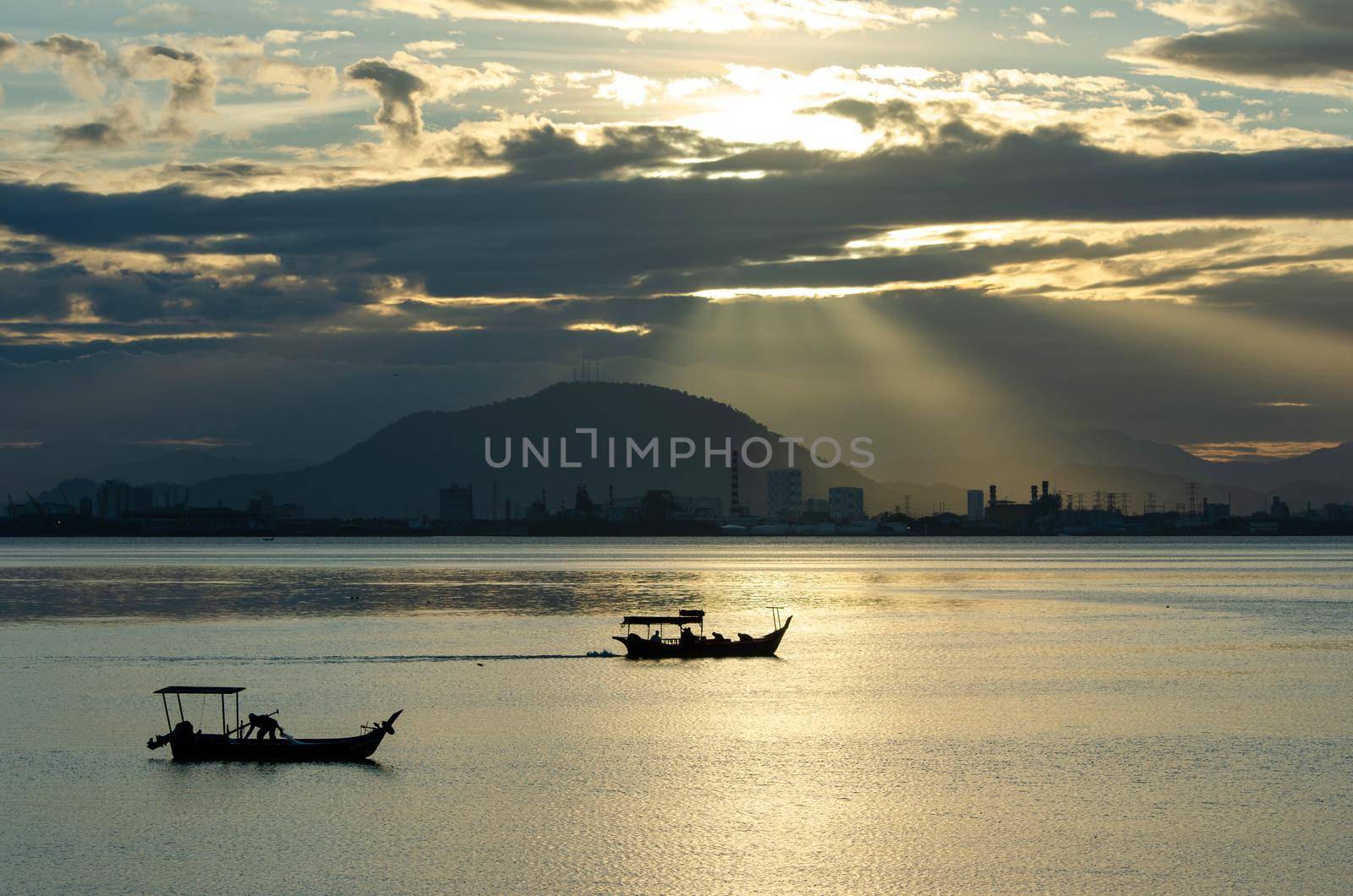 Georgetown, Penang/Malaysia - Feb 27 2016: Two boat under the sunray at sea.