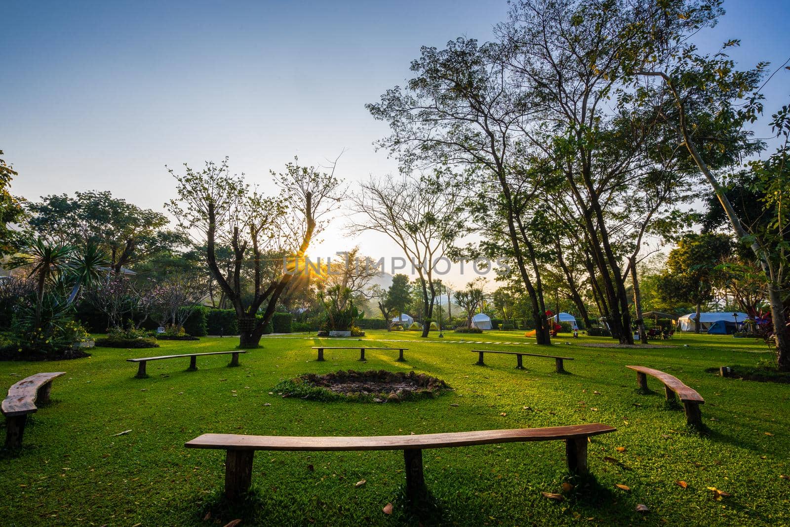 circle bench and sunrise in the park