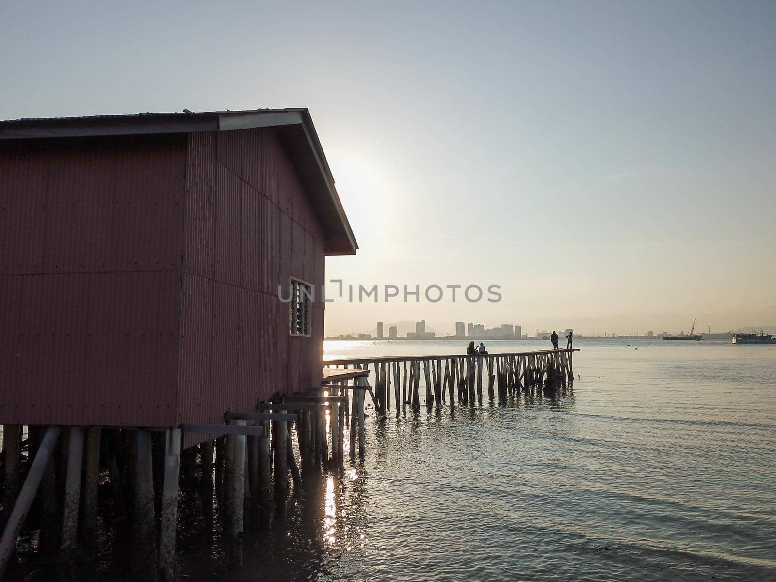 Georgetown, Penang/Malaysia - Feb 29 2020: Red temple in morning at Tan Jetty.