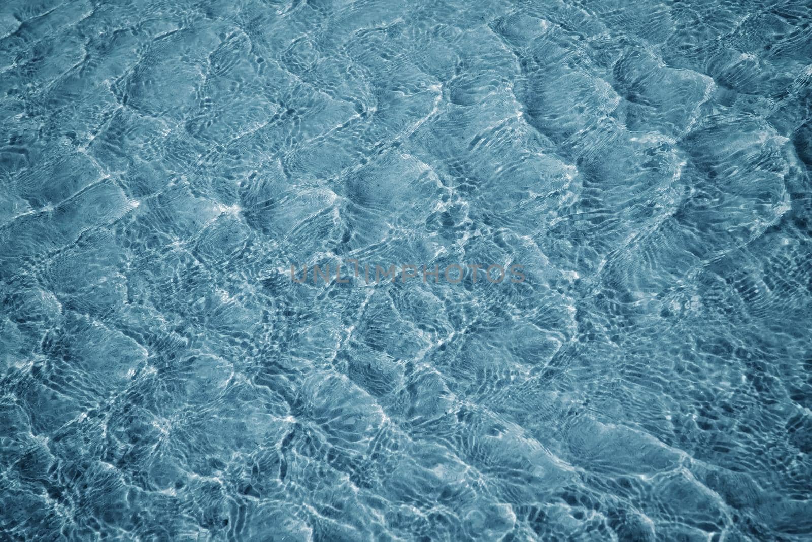 Surface of blue sea water with ripples. Water surface background, texture.