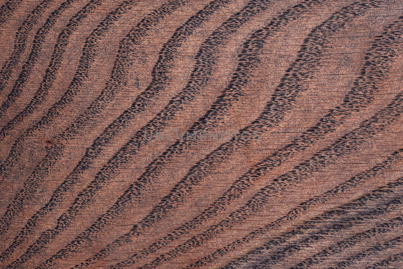 Old grungy burning wood cutting board surface texture. Rustic old reclaimed wood background