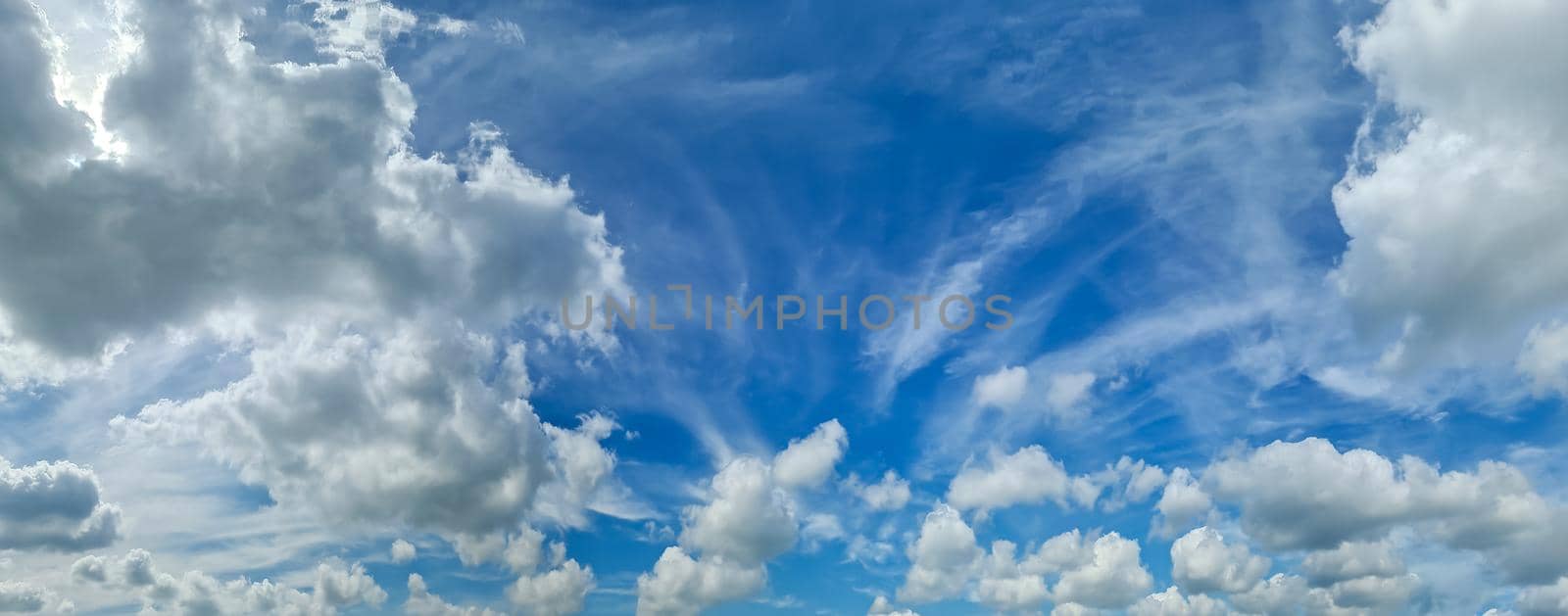 Stunning cirrus cloud formation panorama in a deep blue sky by MP_foto71