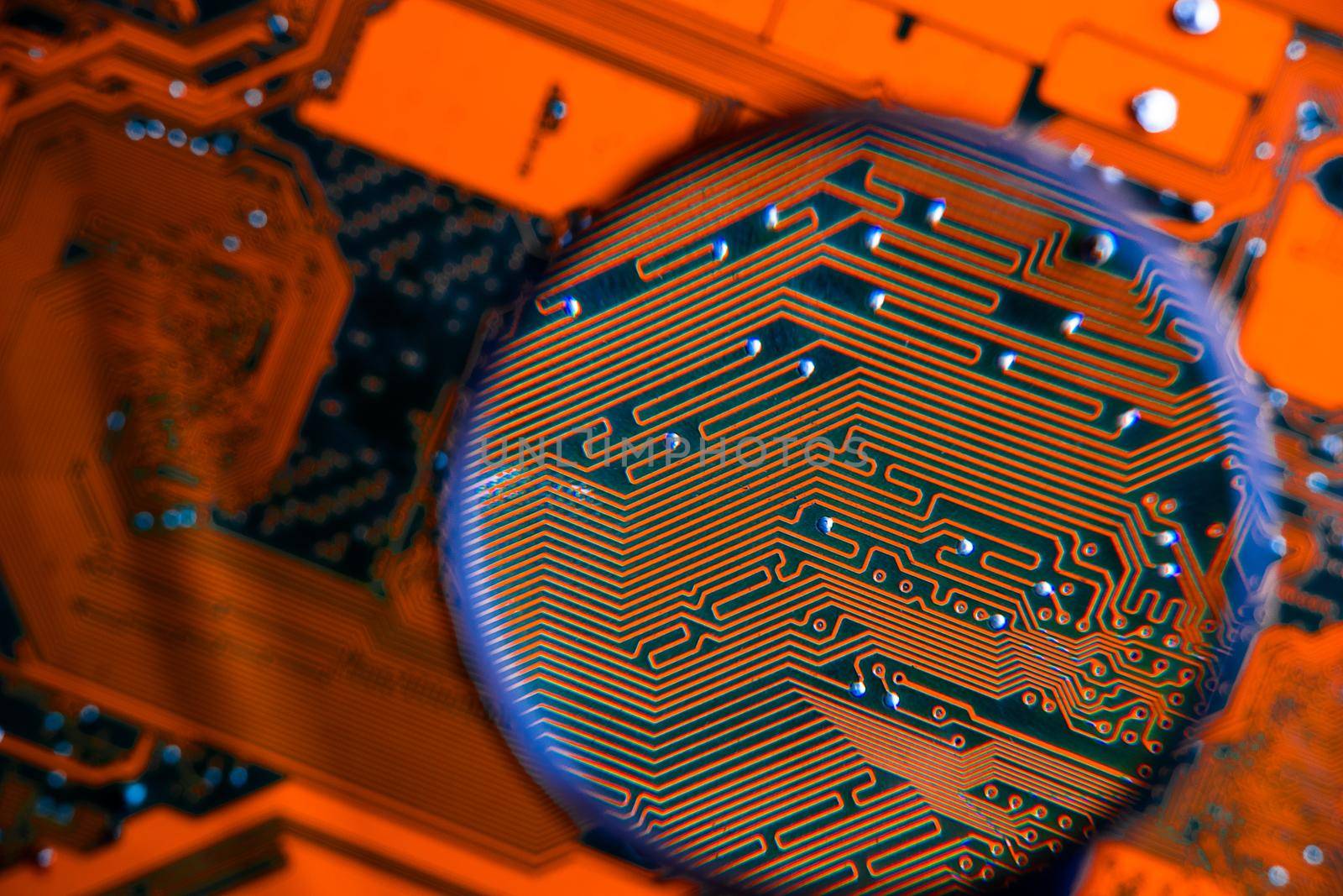 Circuit board of computer motherboard, concept background Computer technology with blue and red colors, for use as a backdrop for presentations. Information Engineering Components and technology.