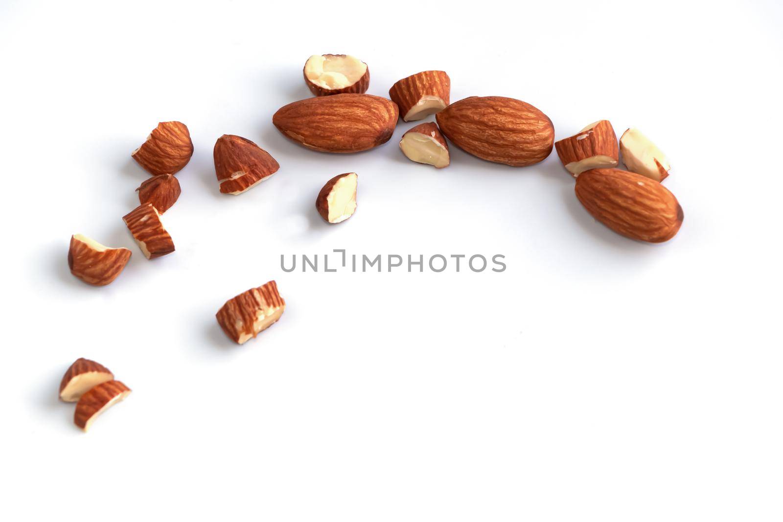 Almonds Delicious. Almonds isolated on white background.