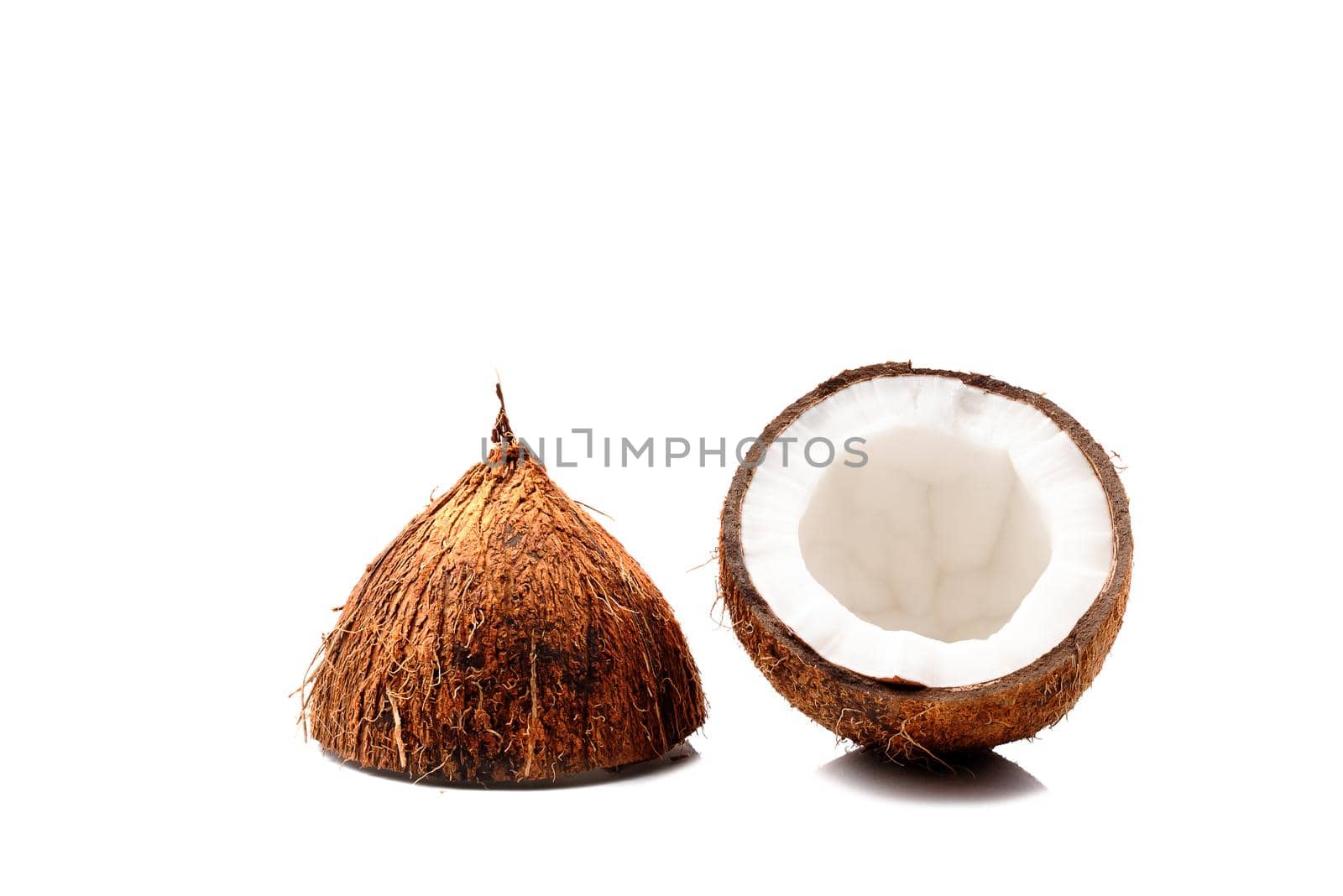 Half of coconut isolated on white background by Estival