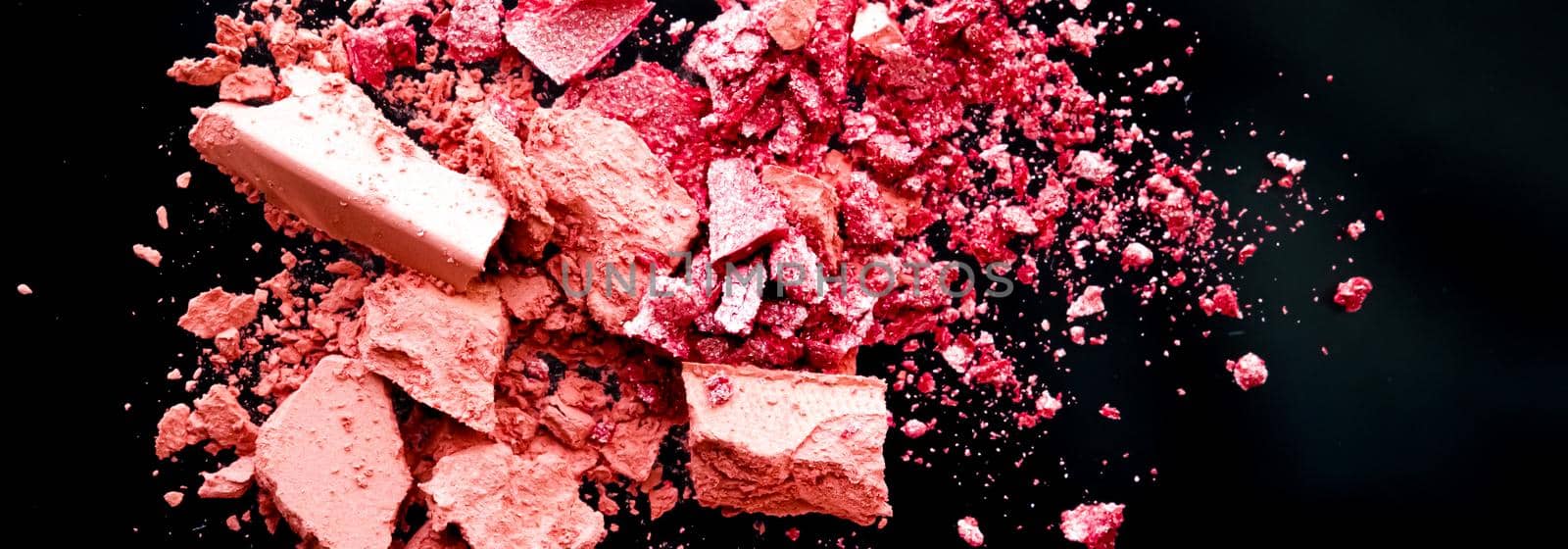 Crushed cosmetics, mineral organic eyeshadow, blush and cosmetic powder isolated on black background, makeup and beauty banner, flatlay design by Anneleven
