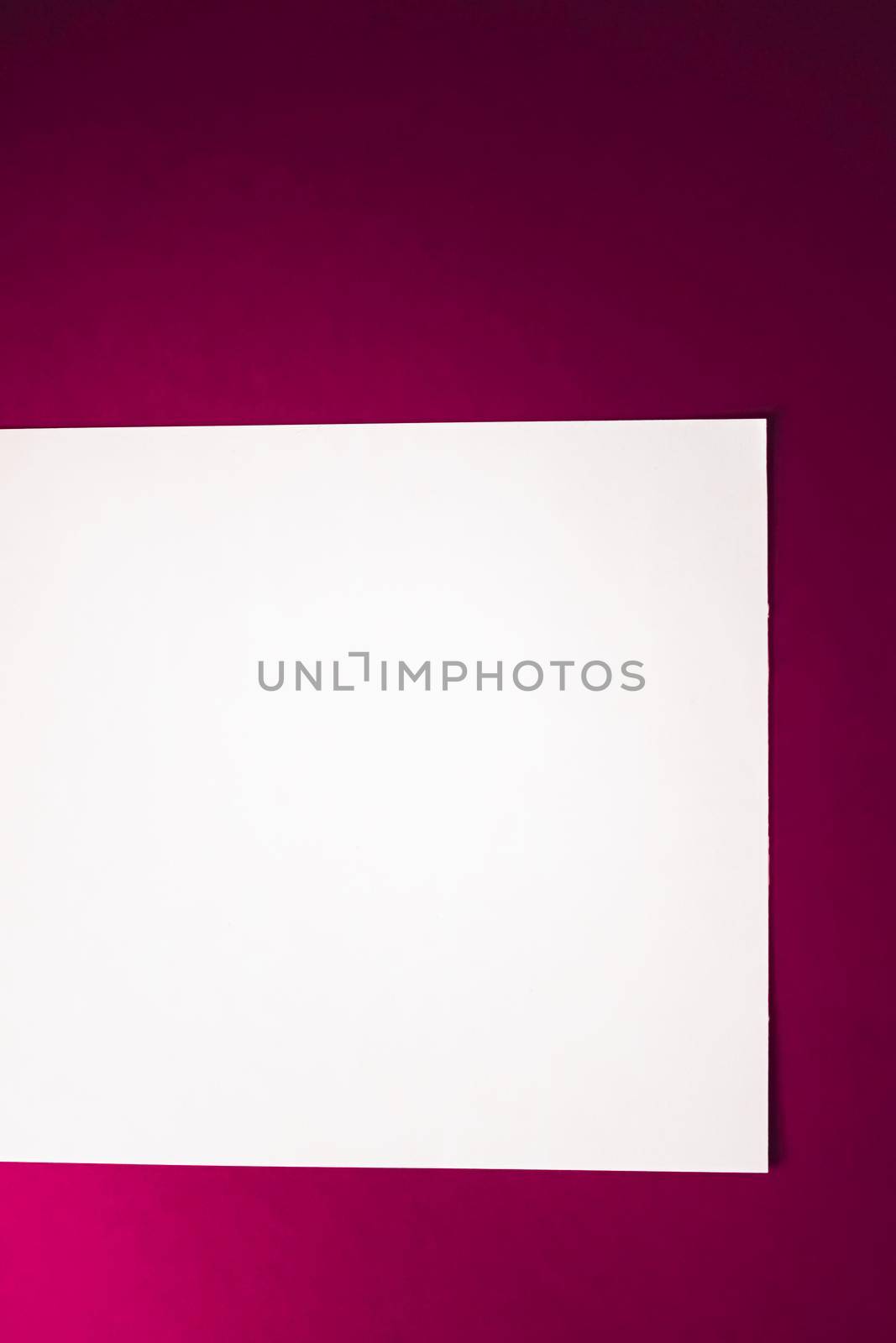 Blank A4 paper, white on pink background as office stationery flatlay, luxury branding flat lay and brand identity design for mockup.