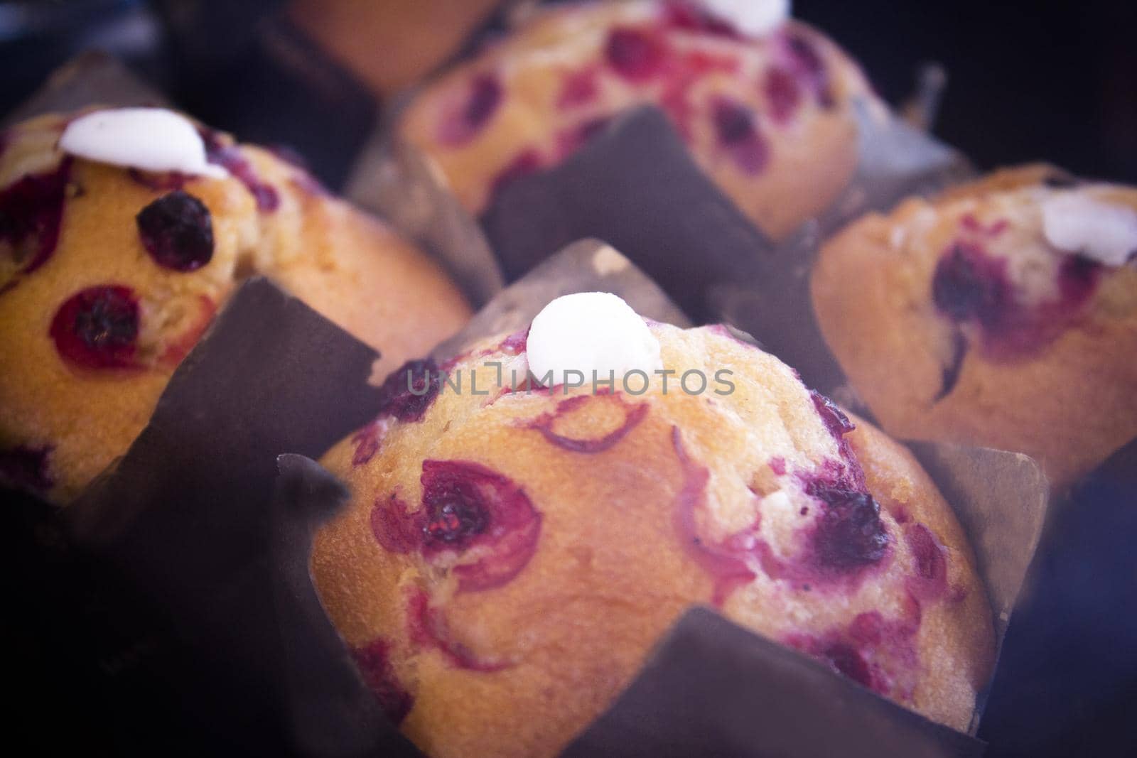 Muffins with strawberry syrup. No people