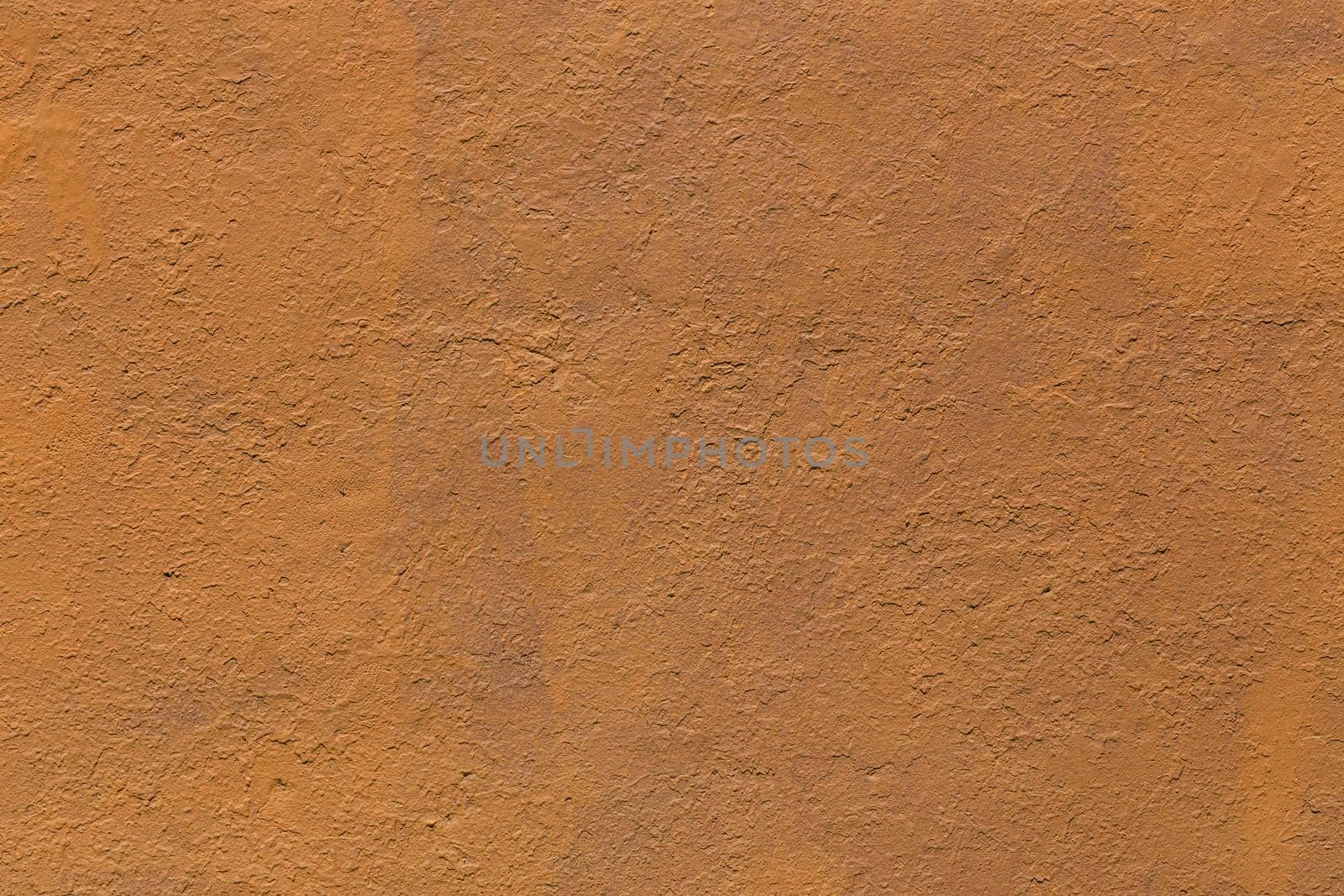 background and texture of flat thick painted matte brown surface under direct sunlight by z1b