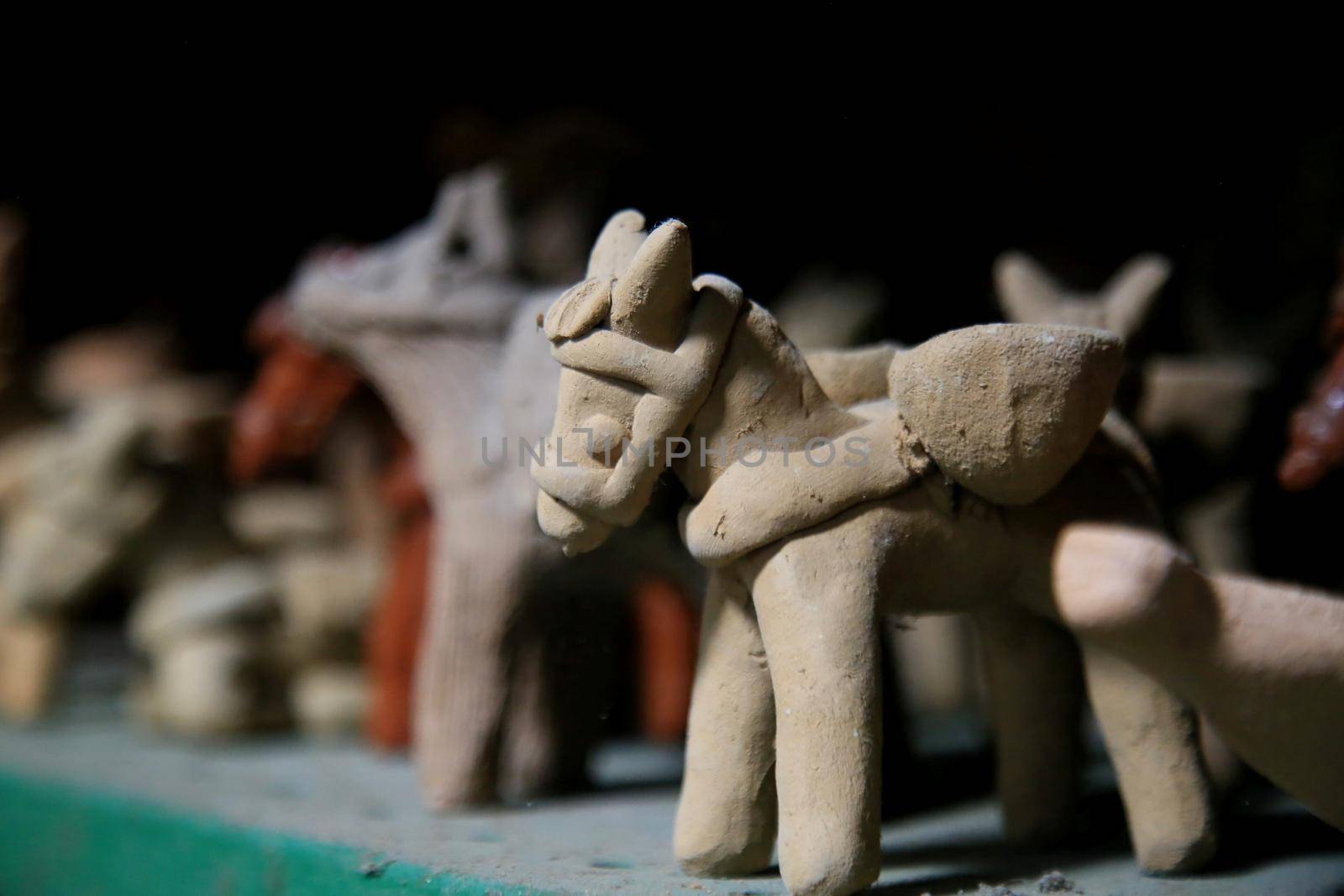 salvador, bahia, brazil - june 28, 2021: pieces made of clay in pottery are seen for sale at the Sao Joaquim fair in the city of Salvador.
