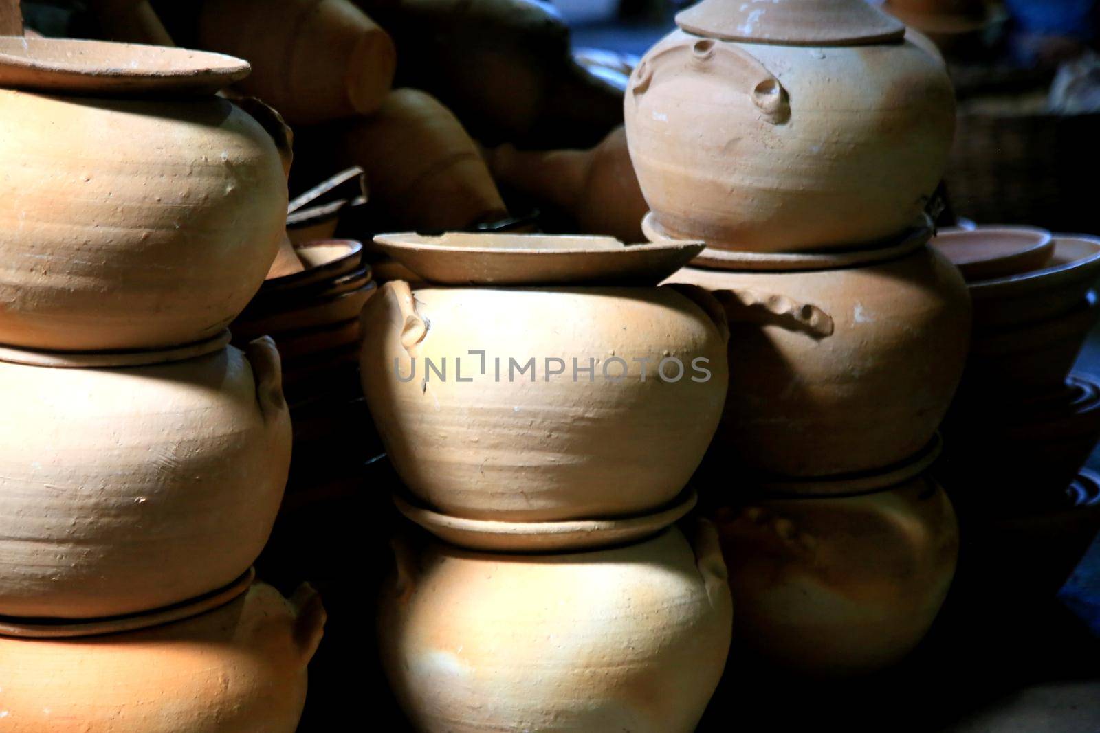 salvador, bahia, brazil - june 28, 2021: pieces made of clay in pottery are seen for sale at the Sao Joaquim fair in the city of Salvador.
