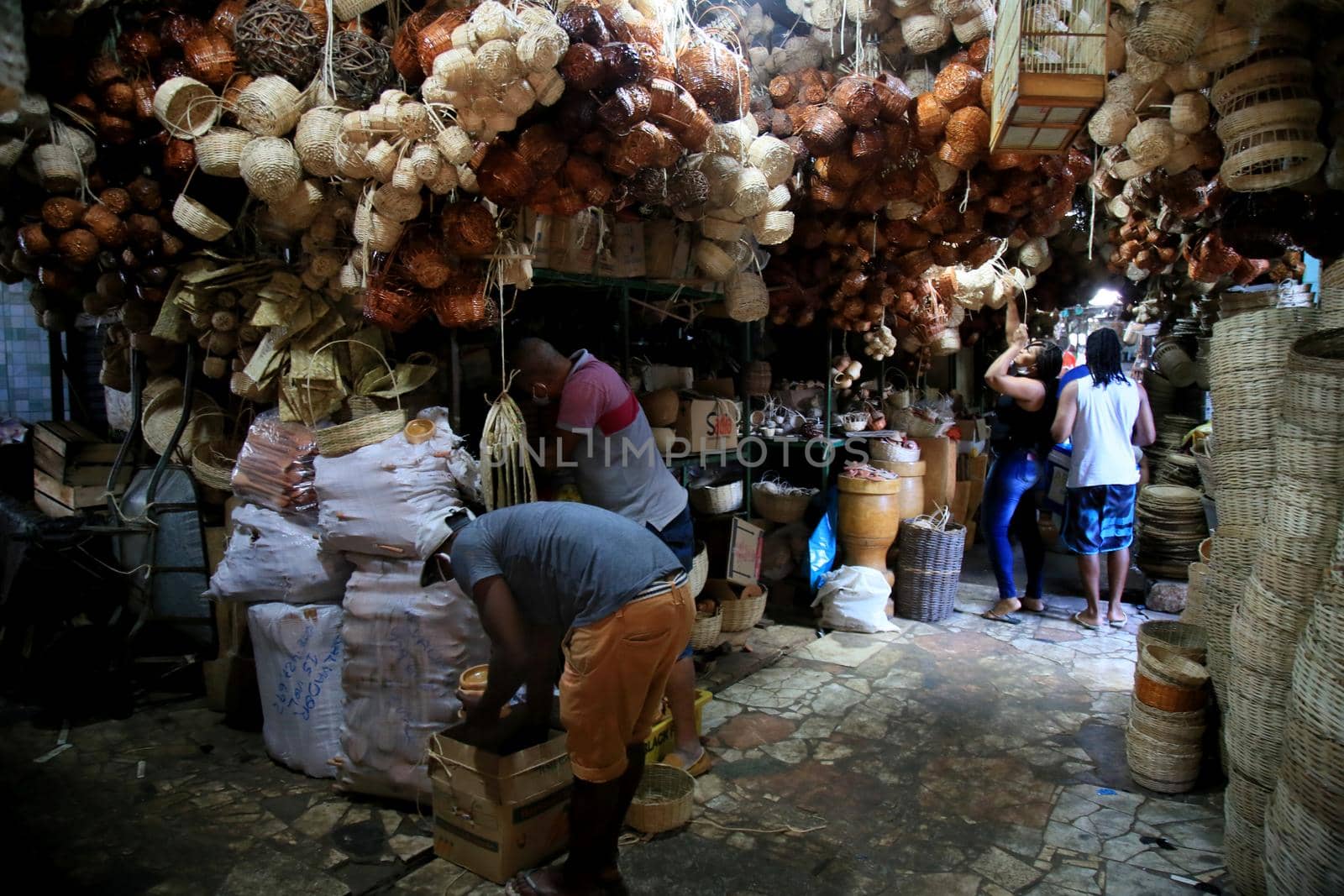 salvador, bahia, brazil - june 28, 2021: People are seen shopping at Sao Joaquim fair in Salvador city.
