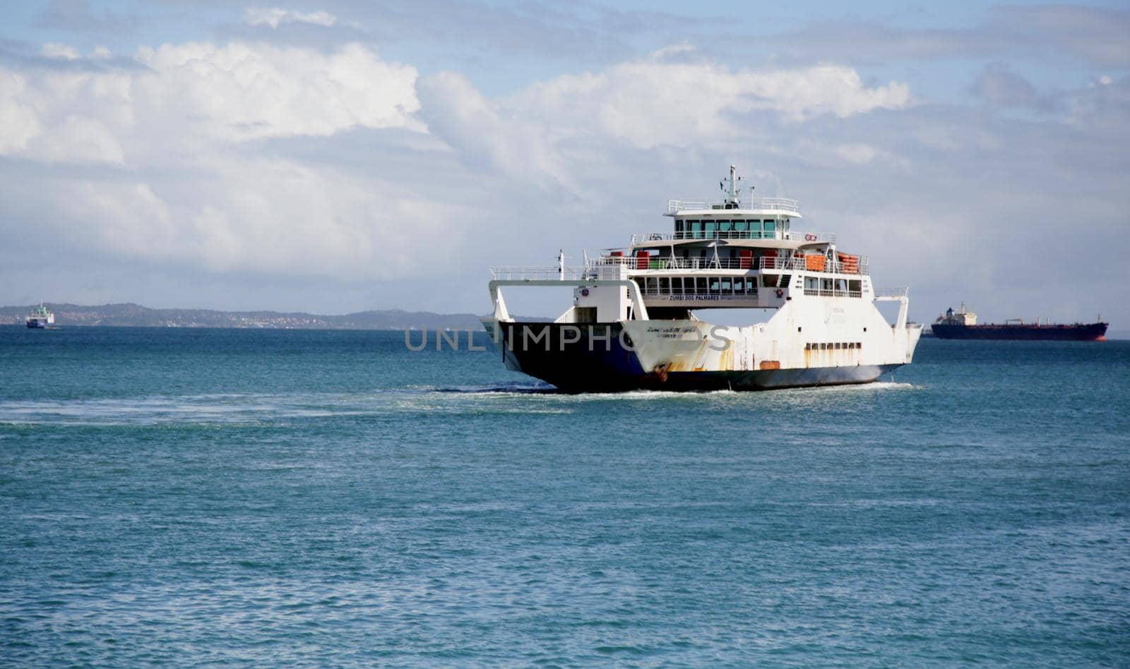 salvador, bahia, brazil - june 28, 2021: Ferry Boat Zumbi dos Palmares seen during approach at Terminal de Sao Joaquim in Salvador city, after crossing Todos os Santos Bay.

