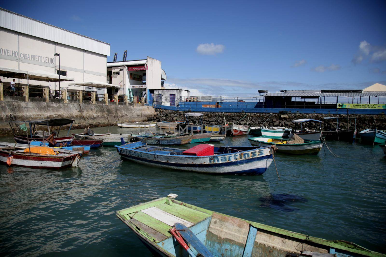 salvador, bahia, brazil - june 28, 2021: Fishing boats are seen moored in a port at Feira de Sao Joaquim in Salvador city.


