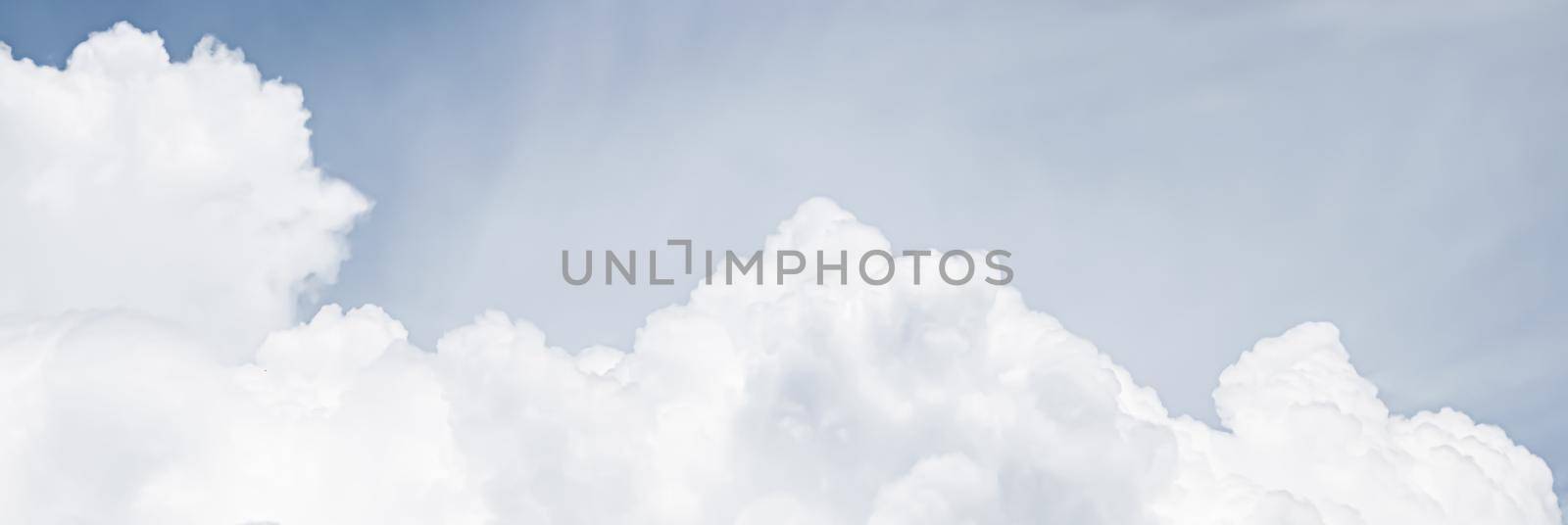 Dreamy surreal sky and clouds as abstract nature background, spiritual design and religion concept.