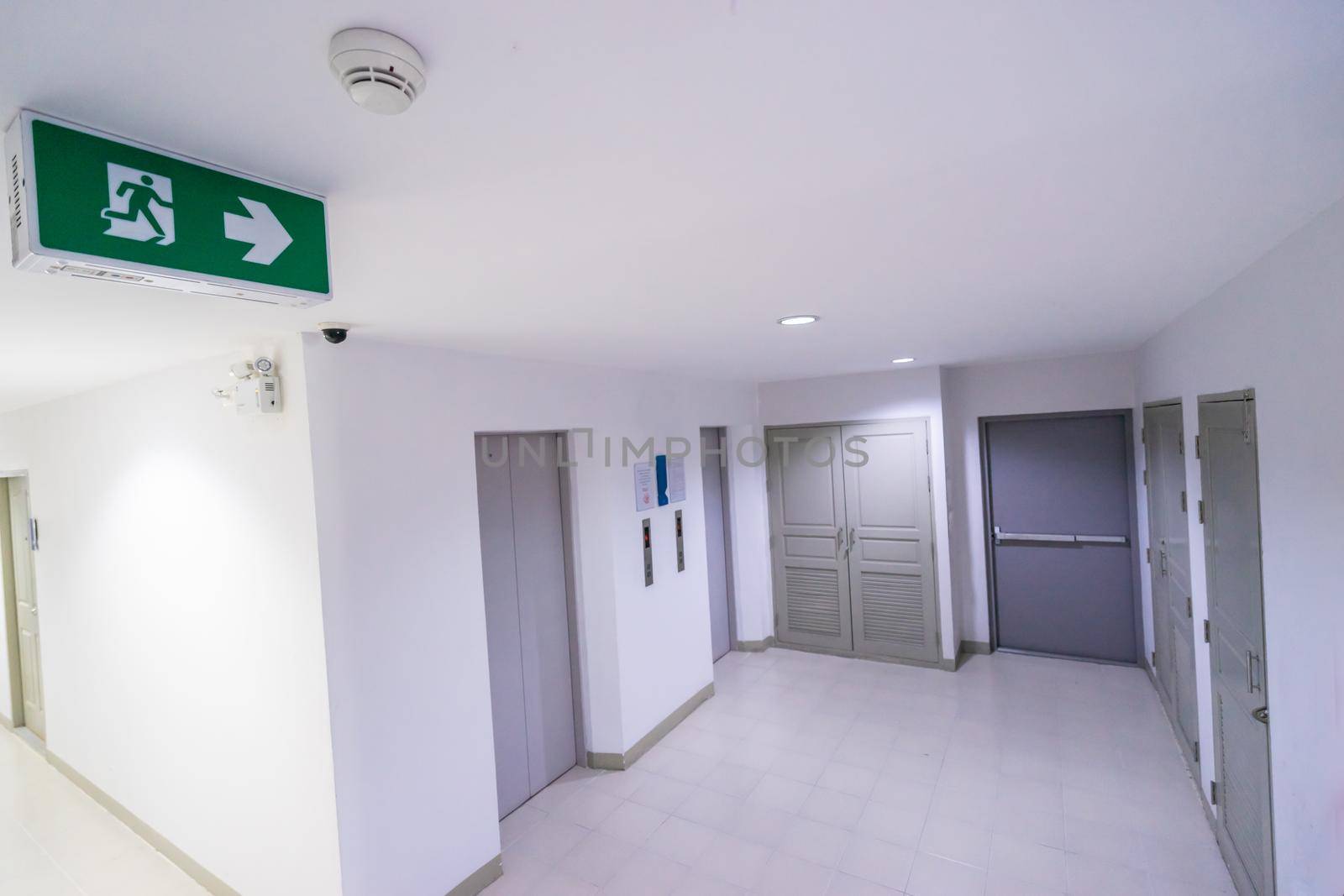 Emergency door escape light sign in building