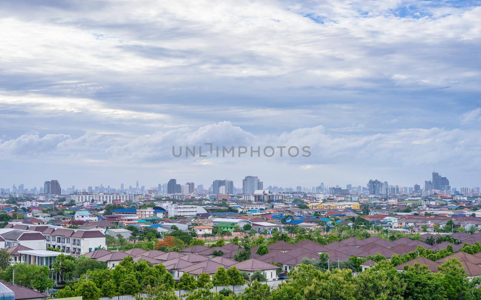 Cityscape and cloudy sky by domonite