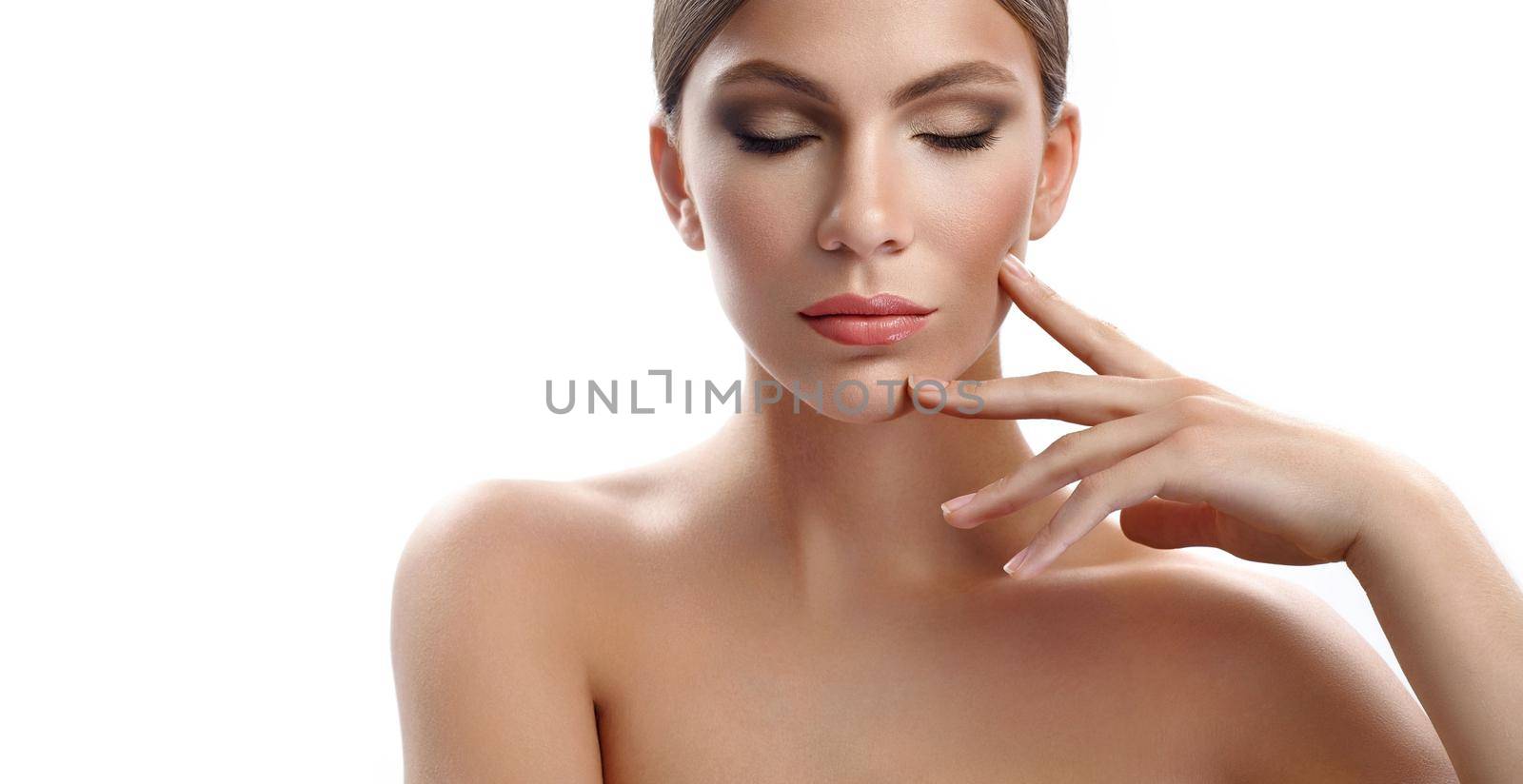 Calm and peace. Cropped horizontal studio portrait of a gorgeous young woman posing with her eyes closed touching her face perfect skin skincare face facial treatment procedure unblemished copyspace