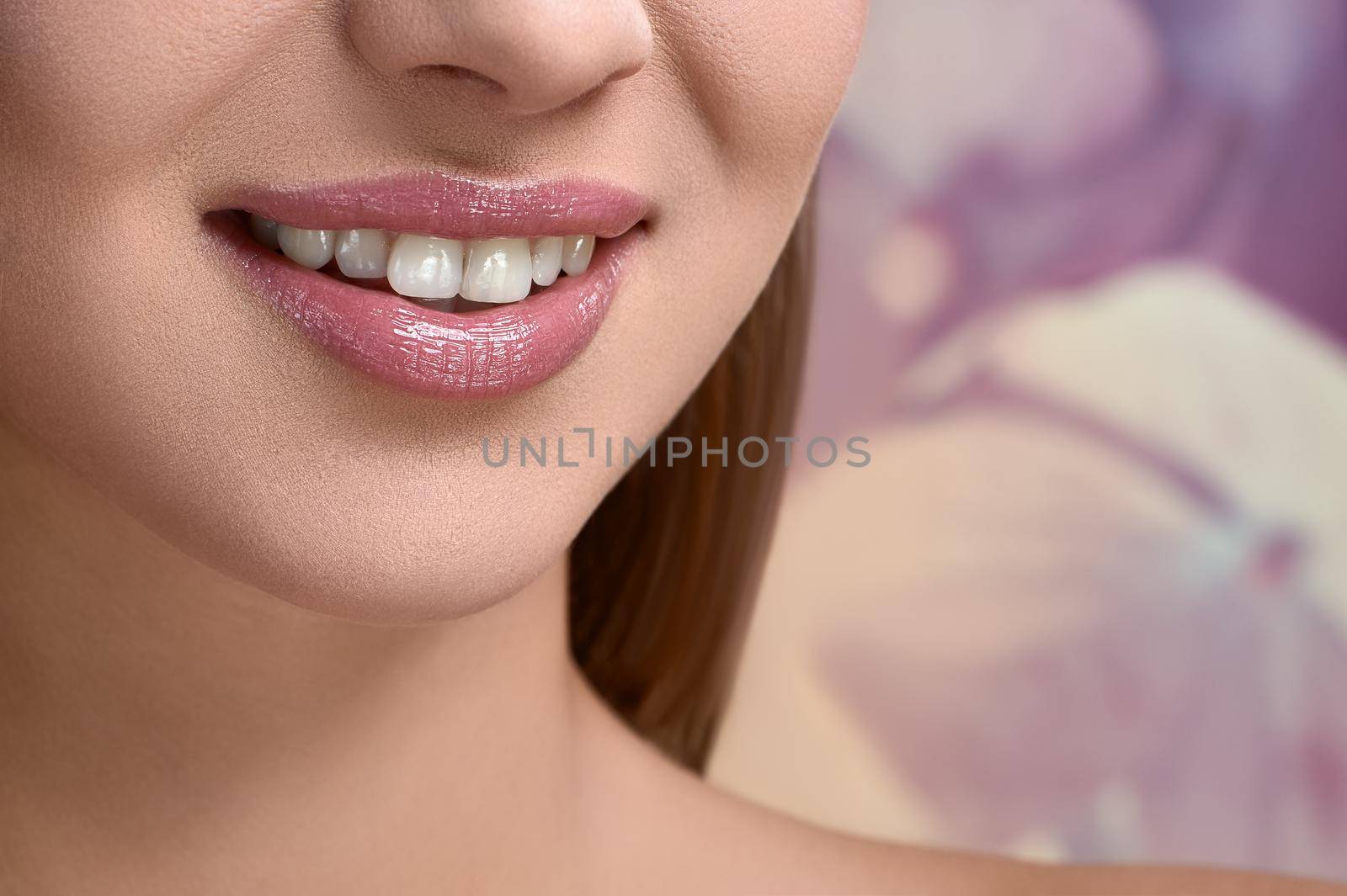 Alluring smile. Horizontal cropped shot of a beautiful woman smiling perfect smile with healthy white teeth copyspace beauty dental dentistry lip gloss cosmetics healthy healthcare concept