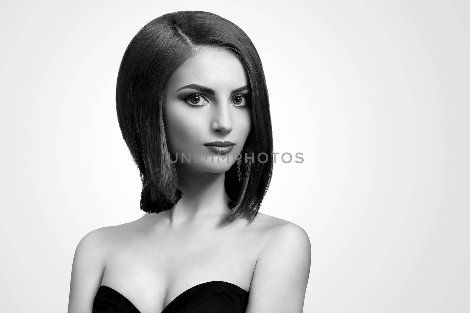 Black and white studio shots of a classy young woman with short by SerhiiBobyk