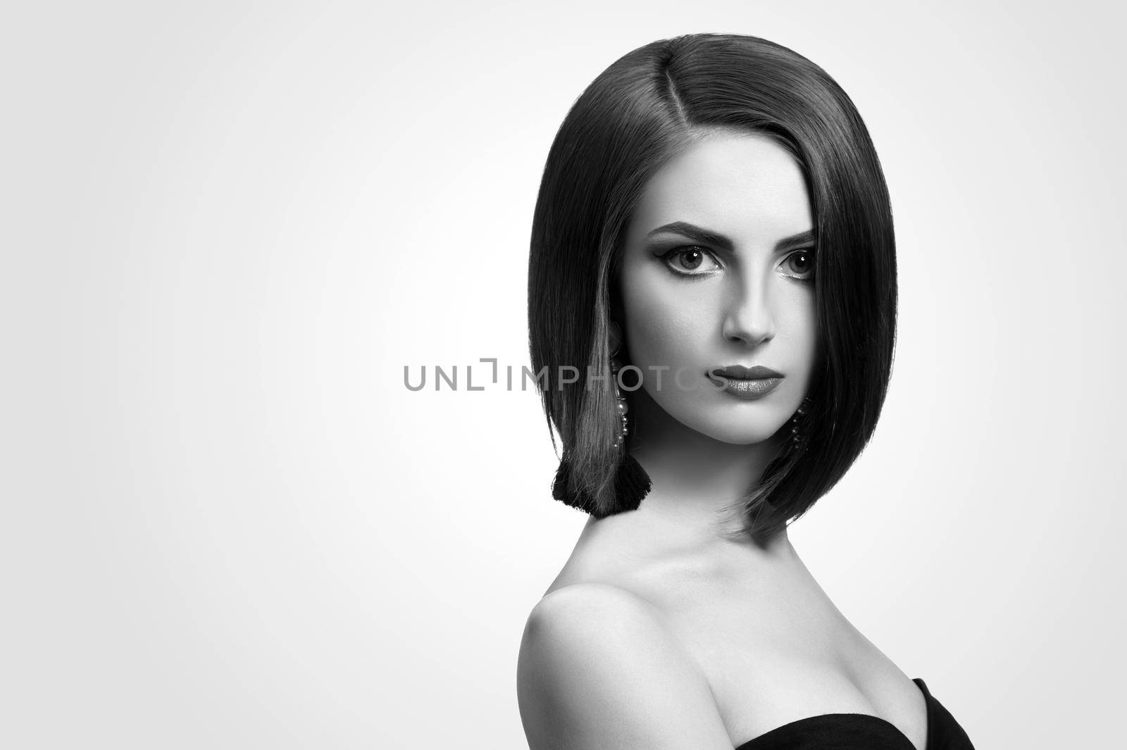 Black and white studio shots of a classy young woman with short by SerhiiBobyk