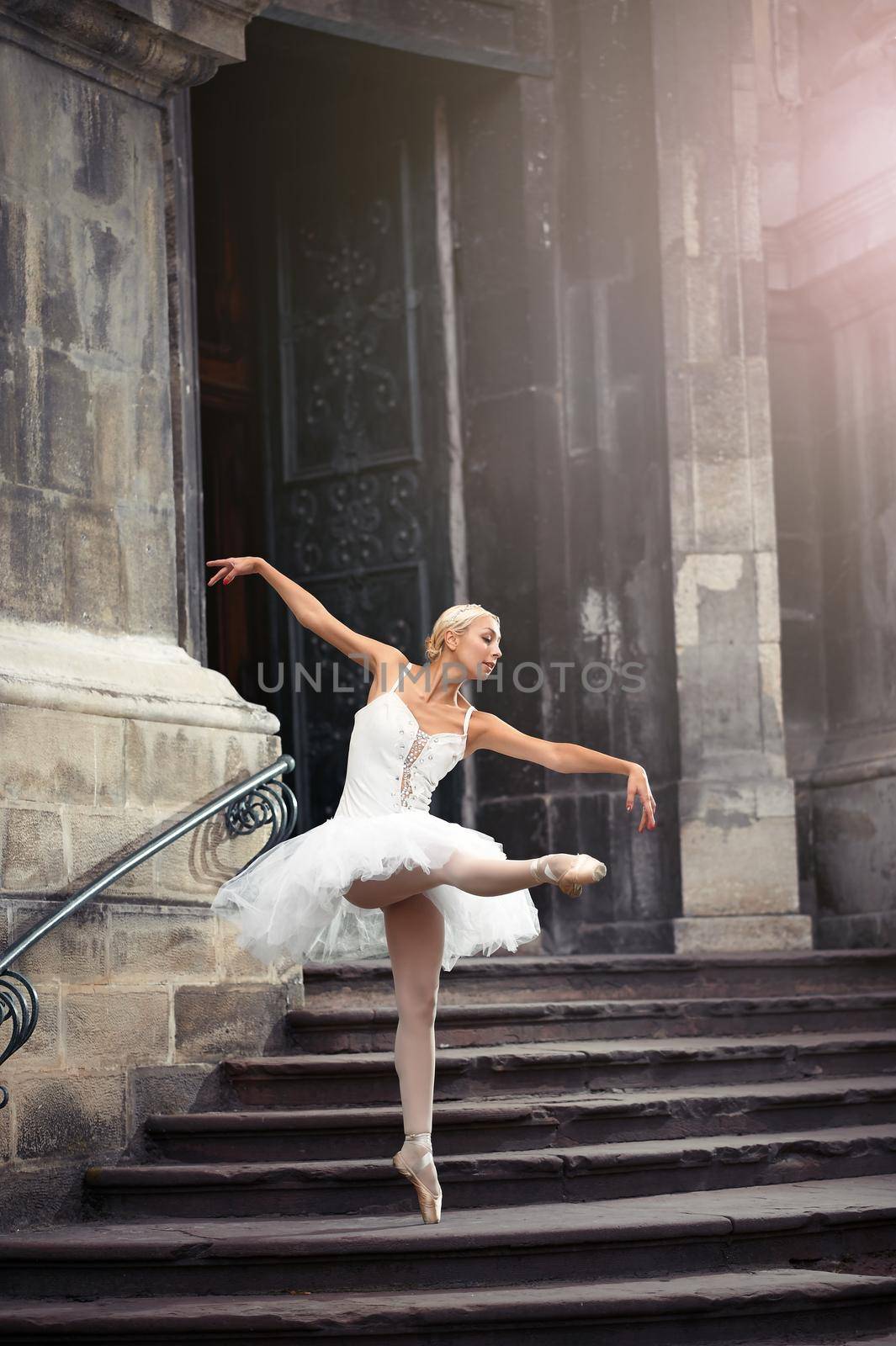 Beautiful ballet woman on stairs by SerhiiBobyk