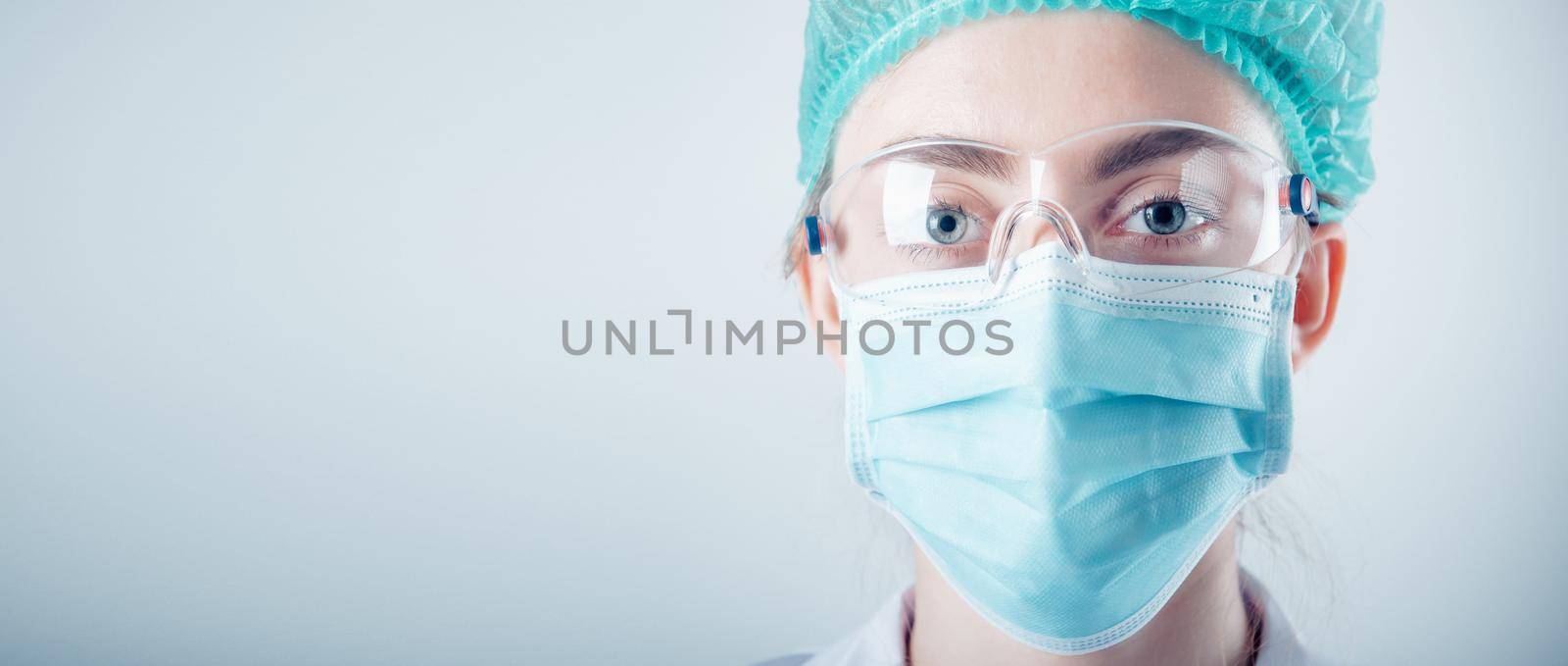 Medical Surgical Doctor and Health Care, Portrait of Surgeon Doctor in PPE Equipment on Isolated Background. Medicine Female Doctors Wearing Face Mask and Cap for Patients Surgery Work. Medic Hospital by MahaHeang245789