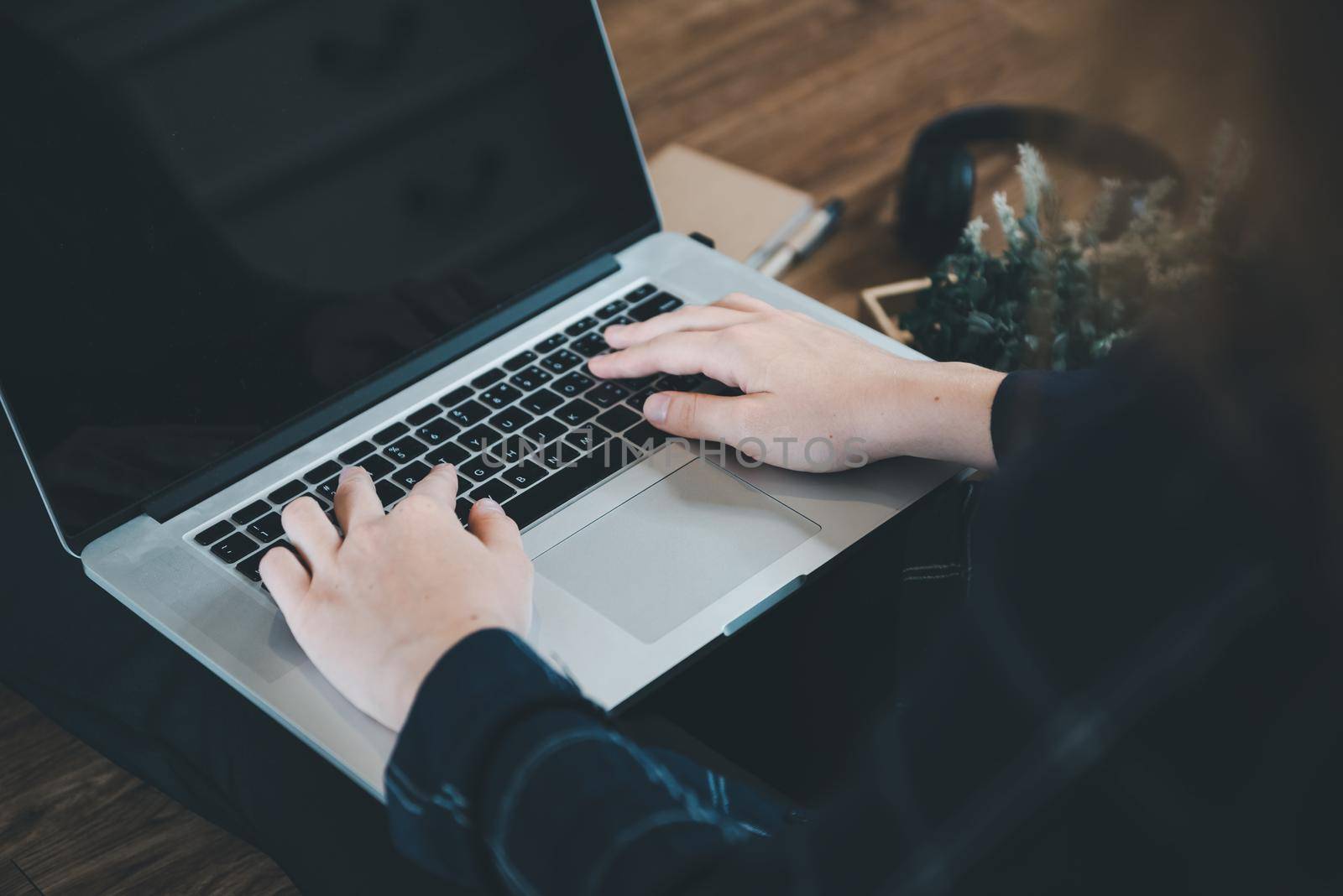 Work From Home Lifestyle and Business Online, Attractive Woman Hands is Typing on Keyboard Laptop While Working at Home. Business Freelance Person Using Computer Laptop at Her Home Workplace