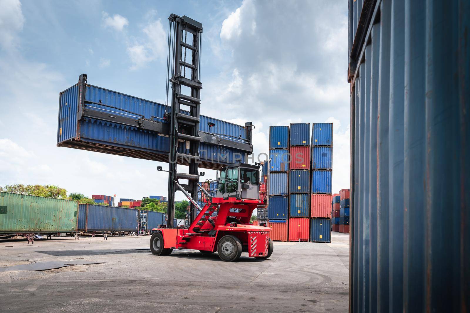 Container Cargo Port Ship Yard Storage of Logistic Transportation Industry. Forklift is Stacking Containers of Freight Import/Export Shipment. Business Shipping Logistics Service Transport Industrial by MahaHeang245789