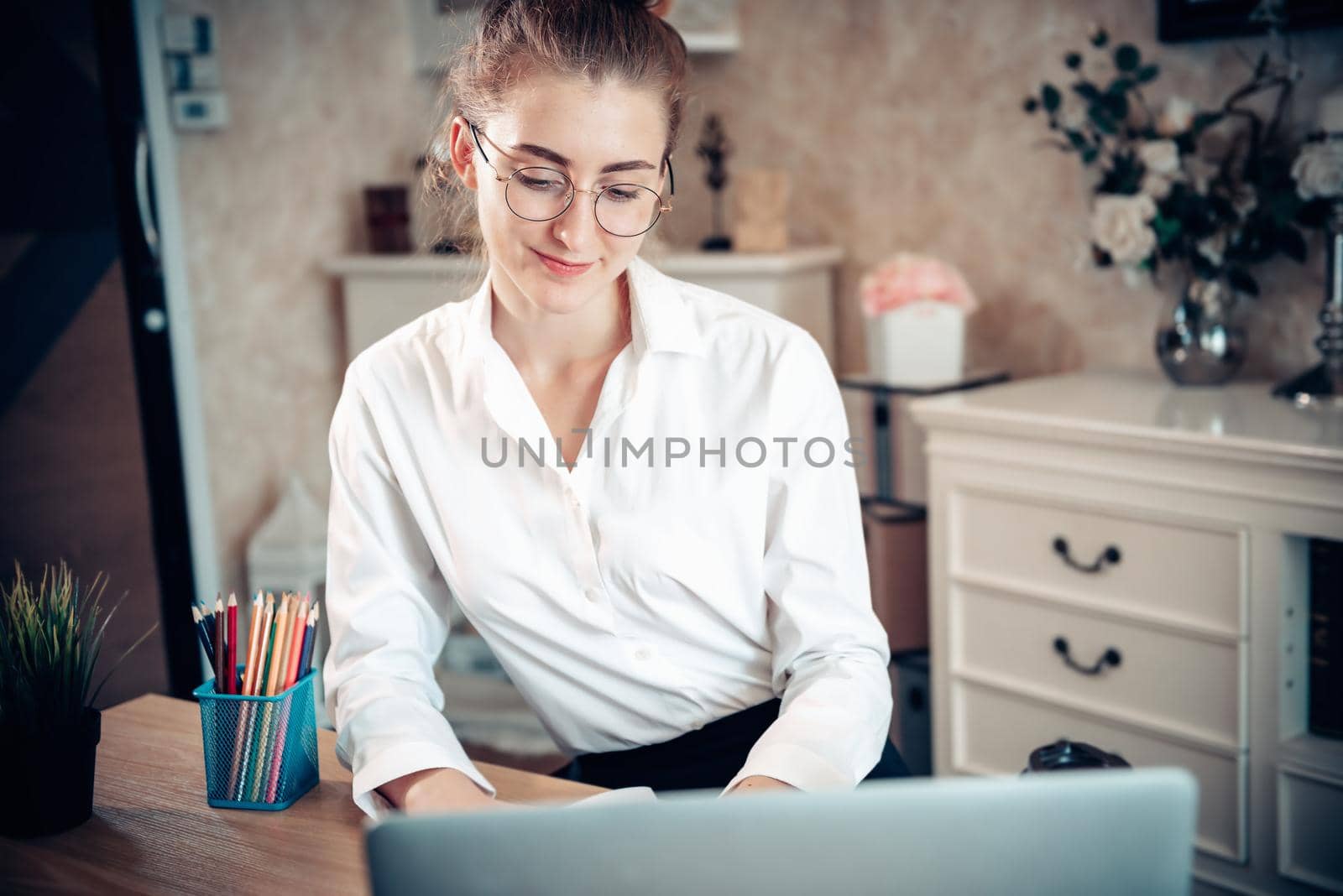 Work From Home Lifestyle and Business Online, Attractive Woman is Using on Laptop While Working at Home. Business Freelance Person Communication Via Internet Network at Her Home, New Normal Lifestyles