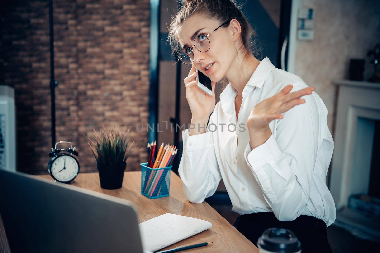 Young Woman Working on Computer Laptop at Home, Businesswoman in Busy Work While Online Conference Virtual Conversation on Laptop From Home. Technology Communication and Creative at Home Concept by MahaHeang245789