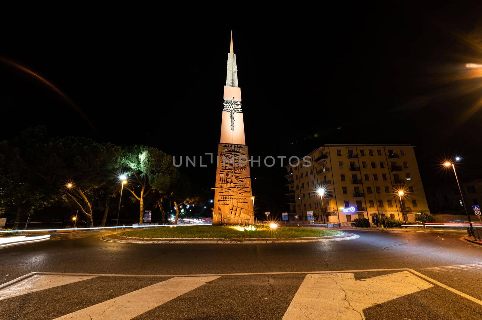 terni,italy june 30 2021:Terni rotunda with the monument of Arnaldo pomodoro at night