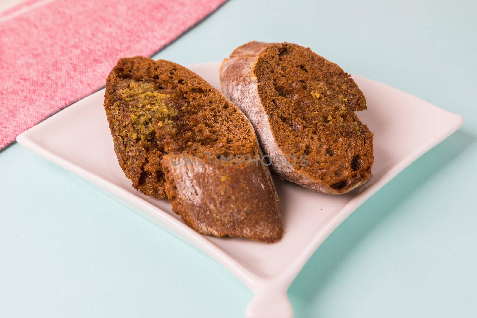 Toasted rye bread in a plate close-up. Morning breakfast.