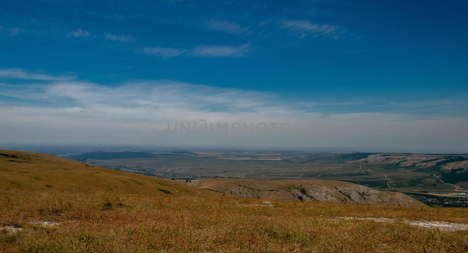 Pid to the surrounding mountains from the lower plateau of Chatyr-Dag in Crimea on a clear sunny day.
