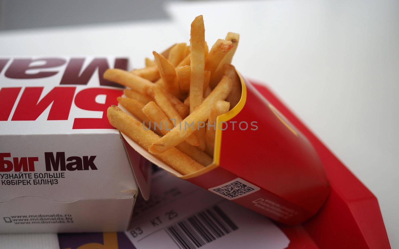 March 10, 2019. Moscow, Russia. Big Mac and fries on a table at McDonald's.