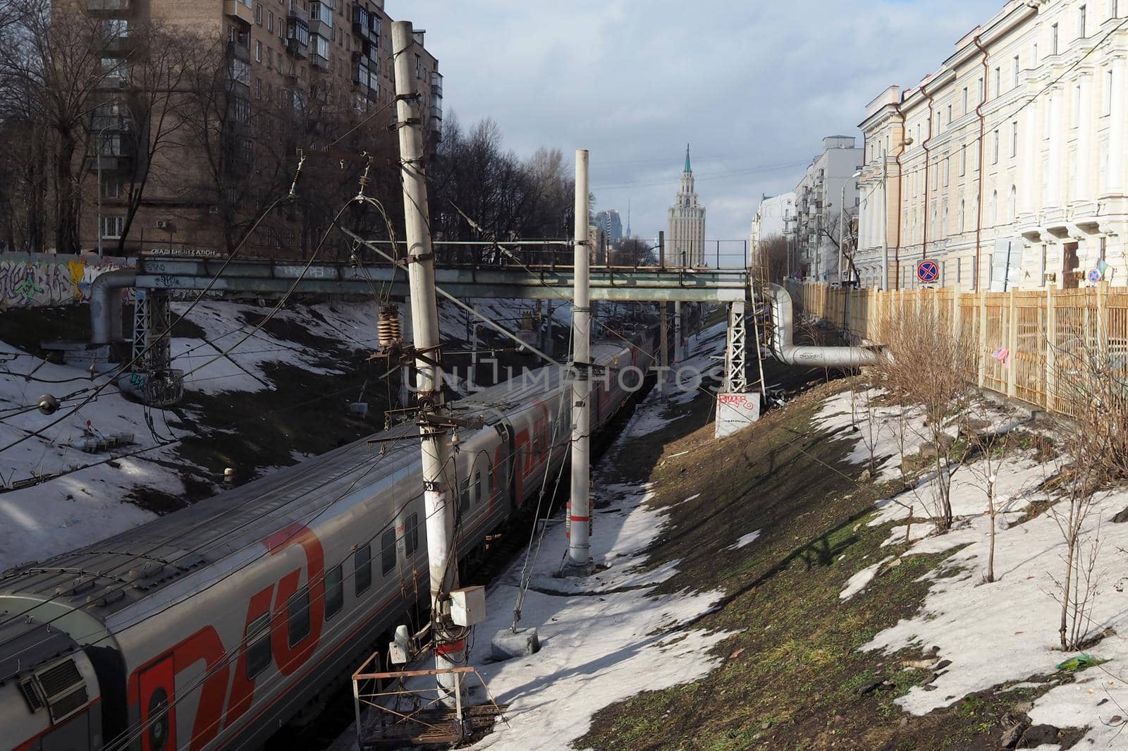 March 10, 2019 Moscow, Russia. A passenger train of the Russian Railways company at the entrance to the Leningradsky railway station in Moscow.