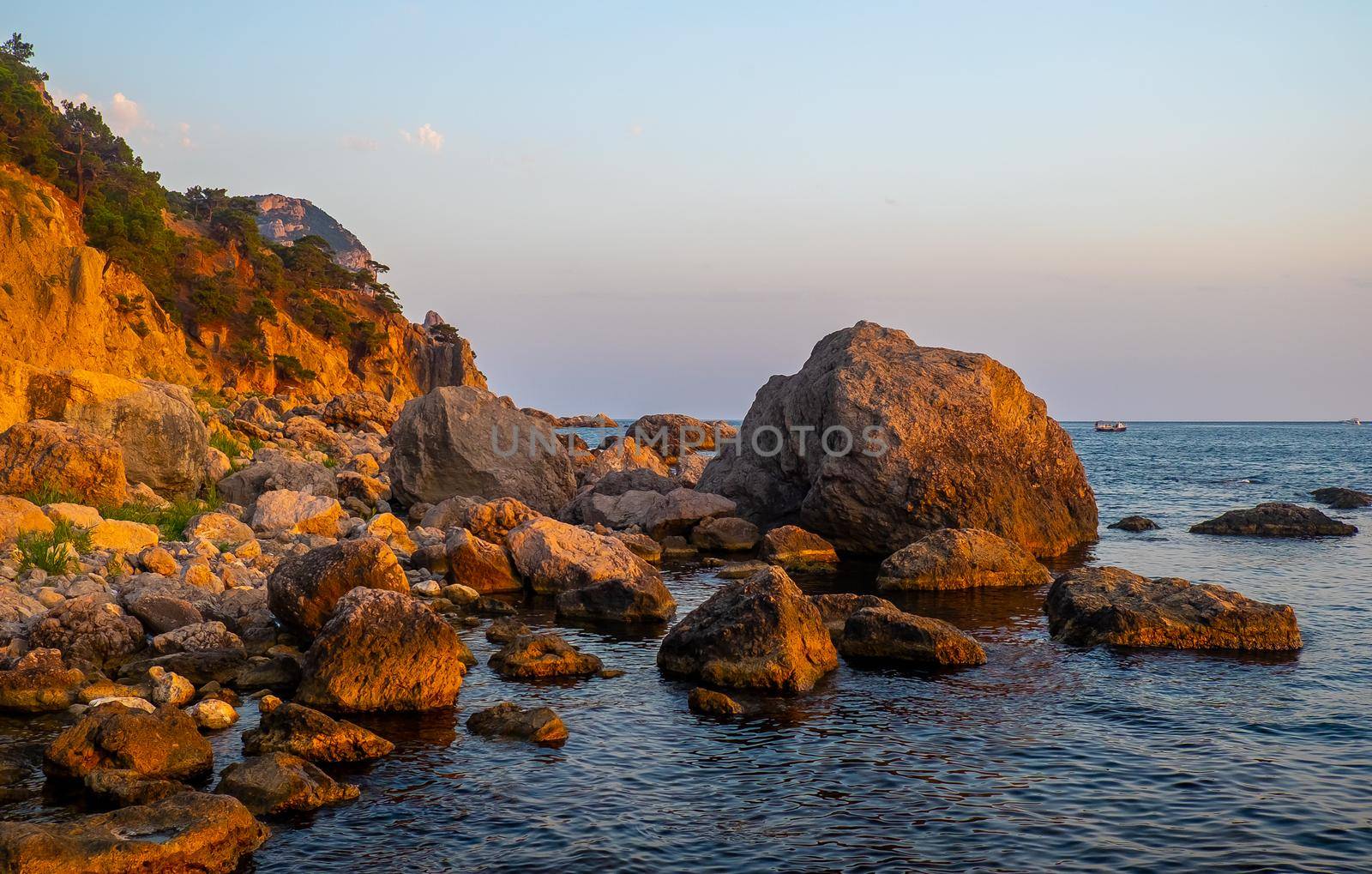 Huge boulders on the shores of a small bay of the Black Sea.