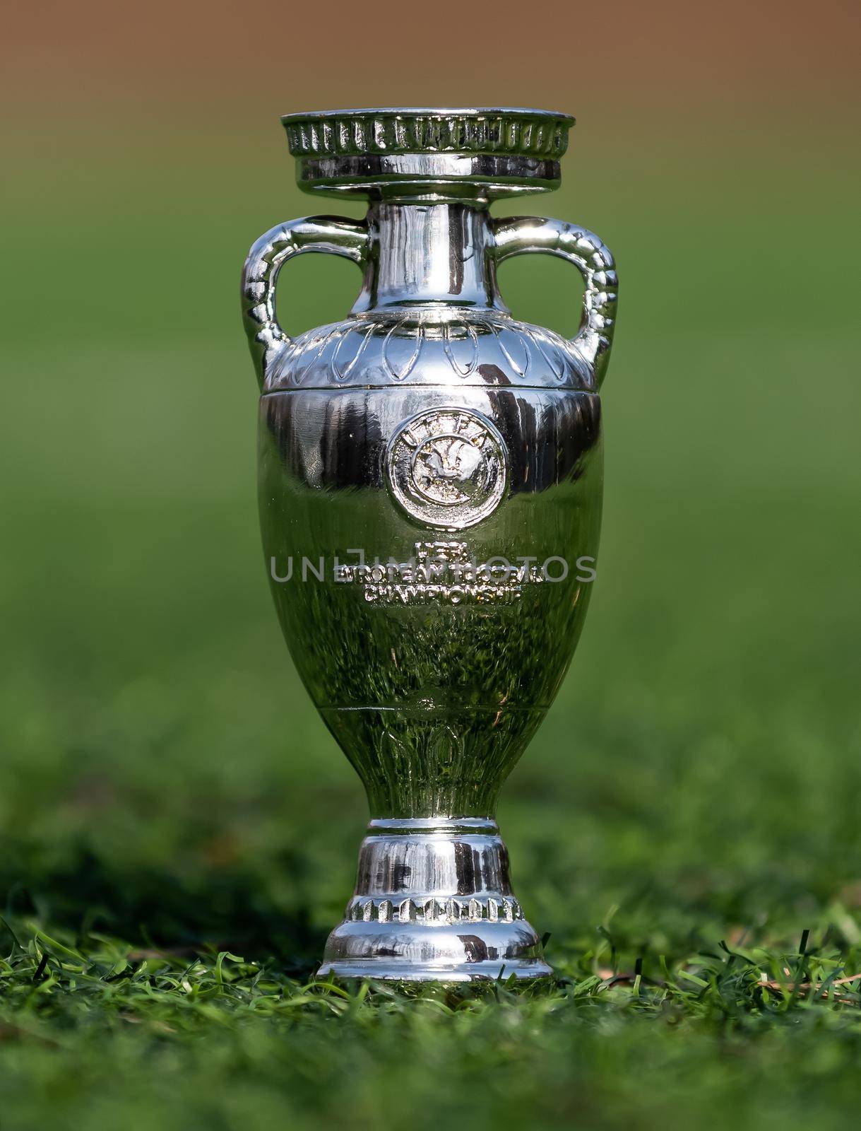 April 13, 2021 Moscow, Russia. The UEFA European Football Championship Cup on the green lawn of the football stadium.