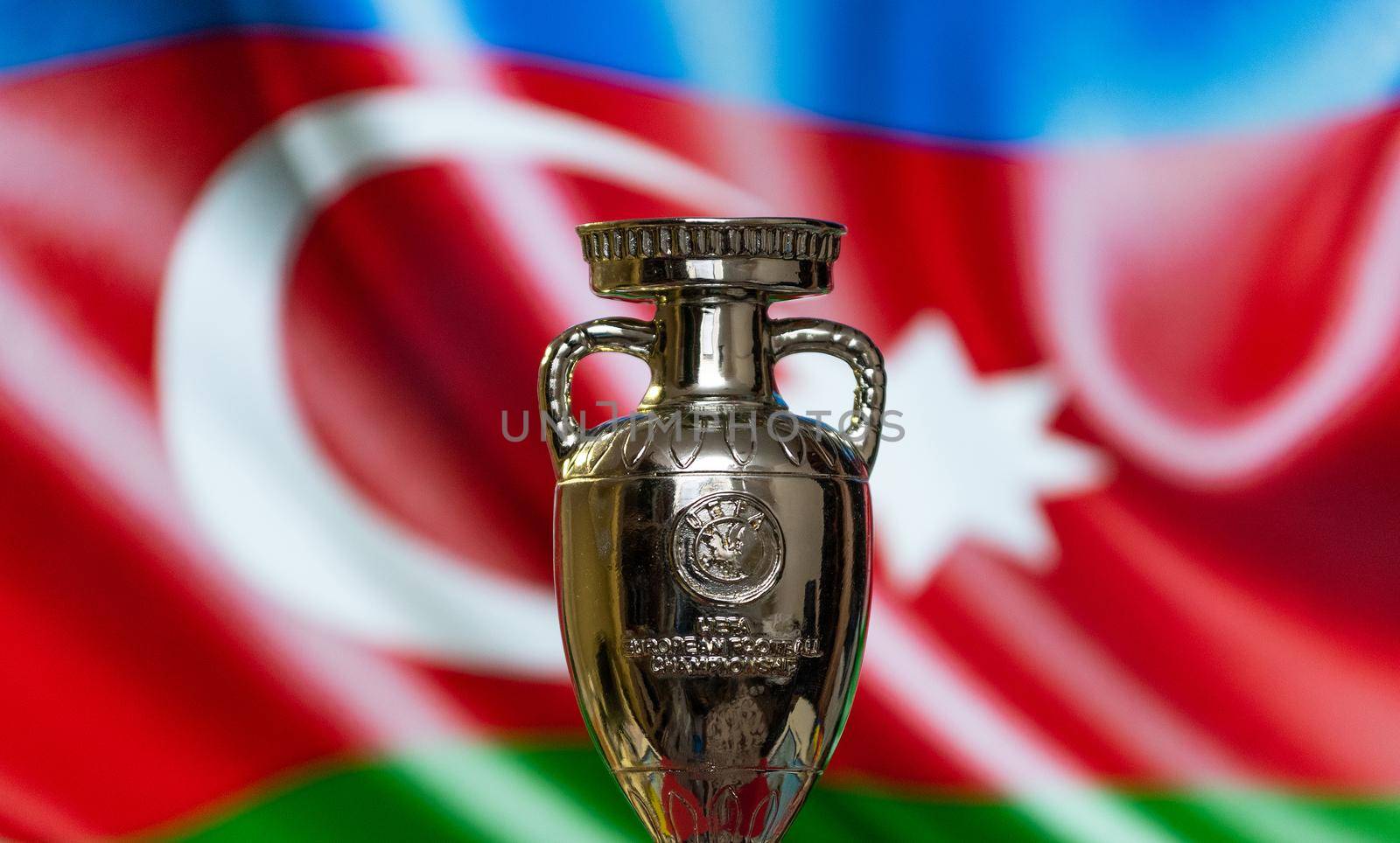 April 10, 2021. Baku, Azerbaijan. UEFA European Championship Cup against the background of the flag of Azerbaijan.