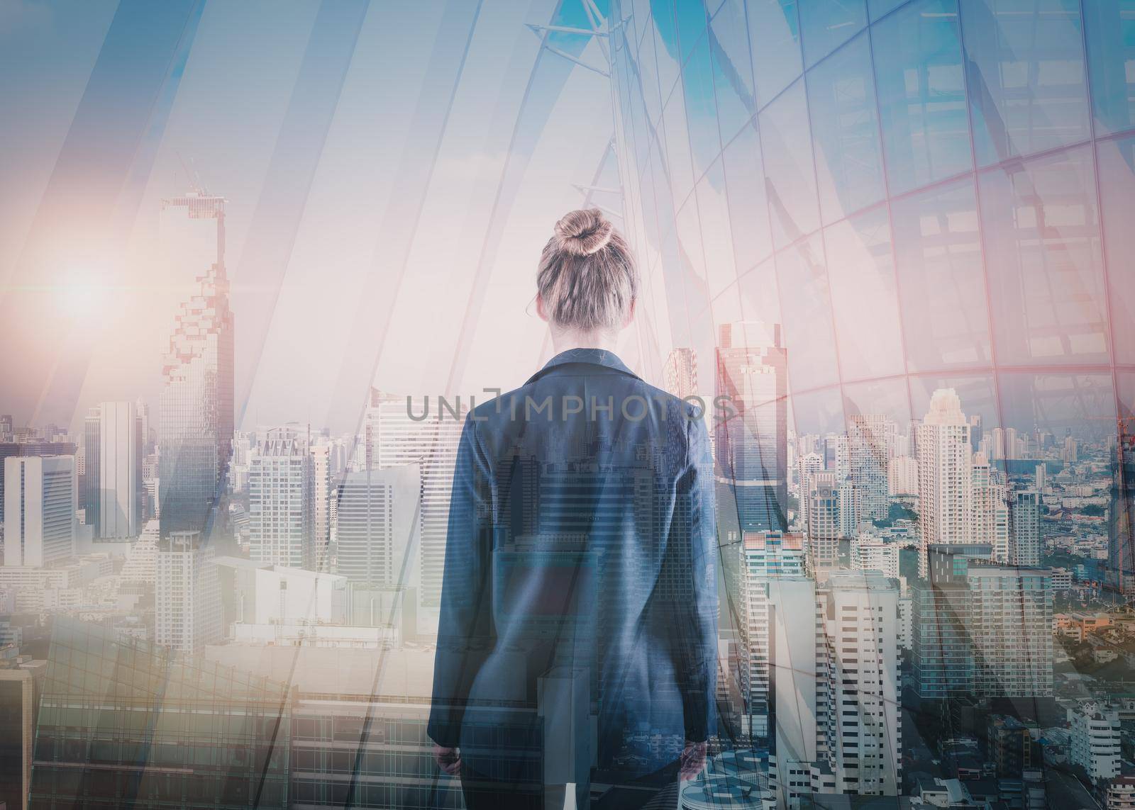 Business Property Development and Investment Concept, Double Exposure of Businesswoman Rear View and Cityscape Buildings. Goal Business Executive Marketing of Successful Entrepreneur by MahaHeang245789
