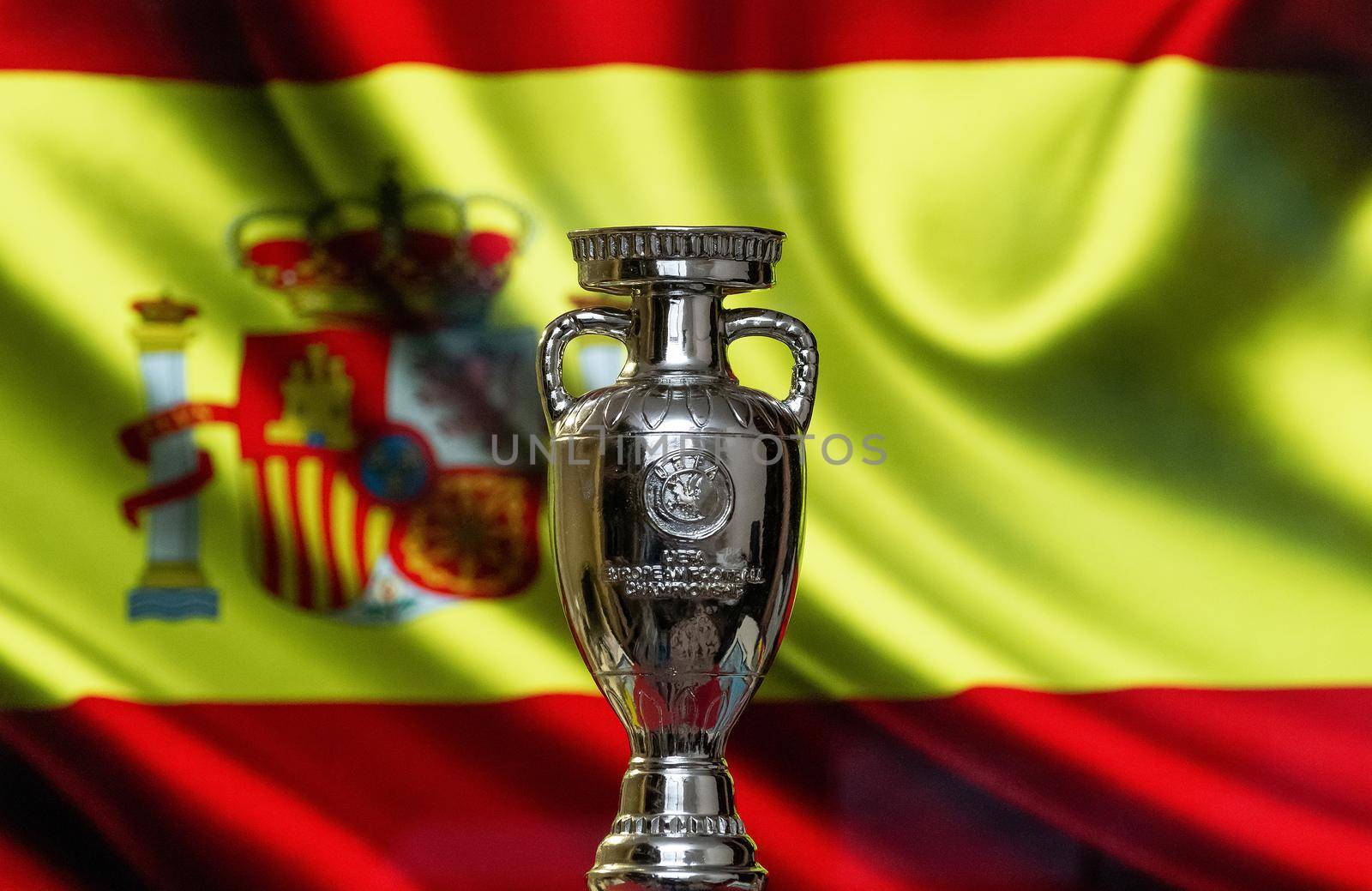 April 10, 2021. Bilbao, Spain. UEFA European Championship Cup with the Spanish flag in the background.