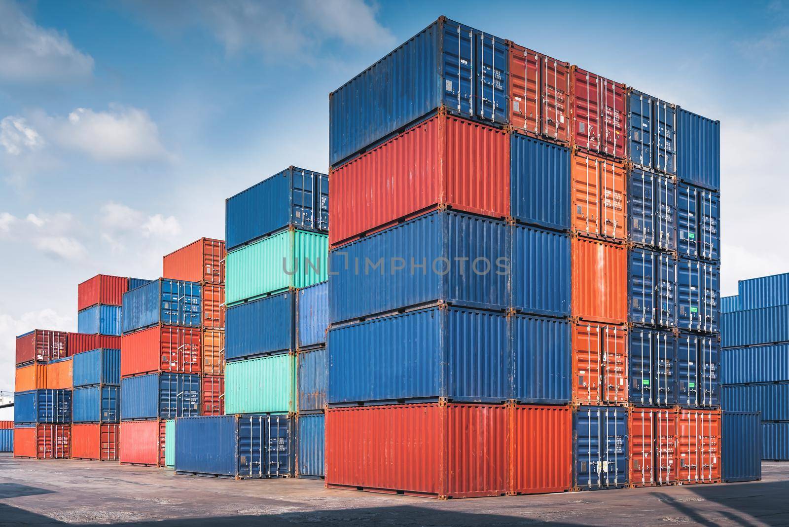 Stack of Containers Cargo Ship Import/Export in Harbor Port, Cargo Freight Shipping of Container Logistics Industry. Nautical Transport Distribution Yard, Business Commercial Dock and Transportation.  by MahaHeang245789