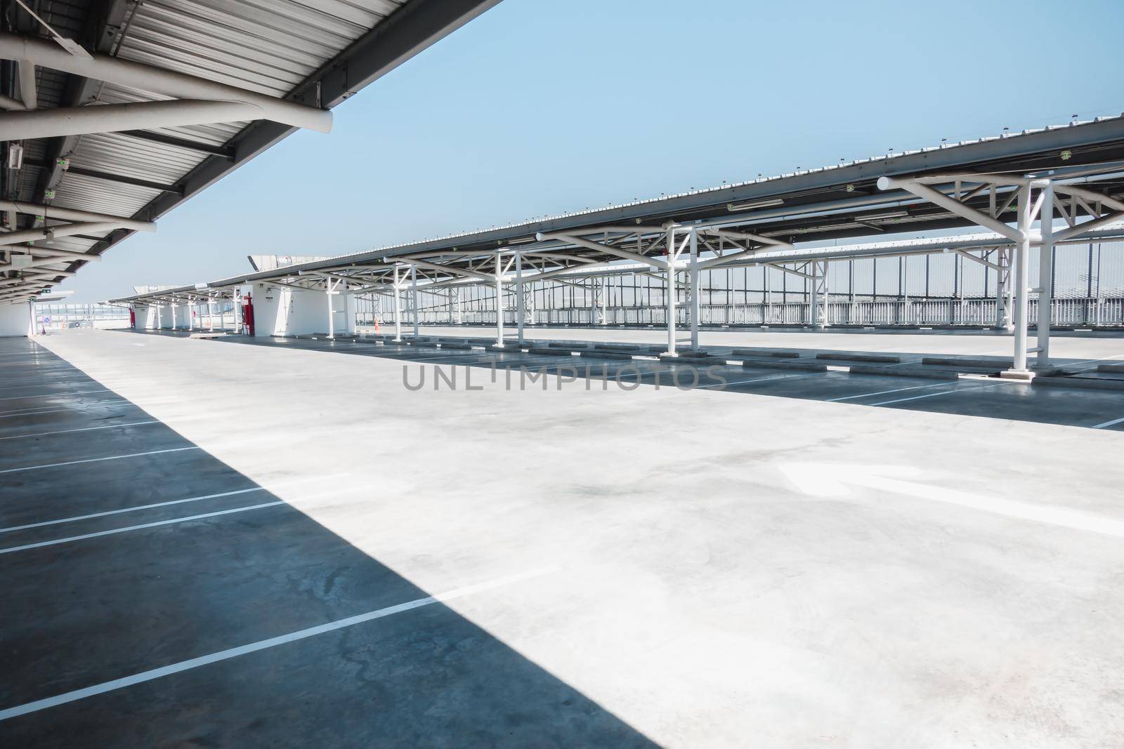 Car Parking Lot Area on Deck Floor of Shopping Mall, Perspective View Empty of Car Park Structure Building at Department Store. Auto Service Parking Lots by MahaHeang245789